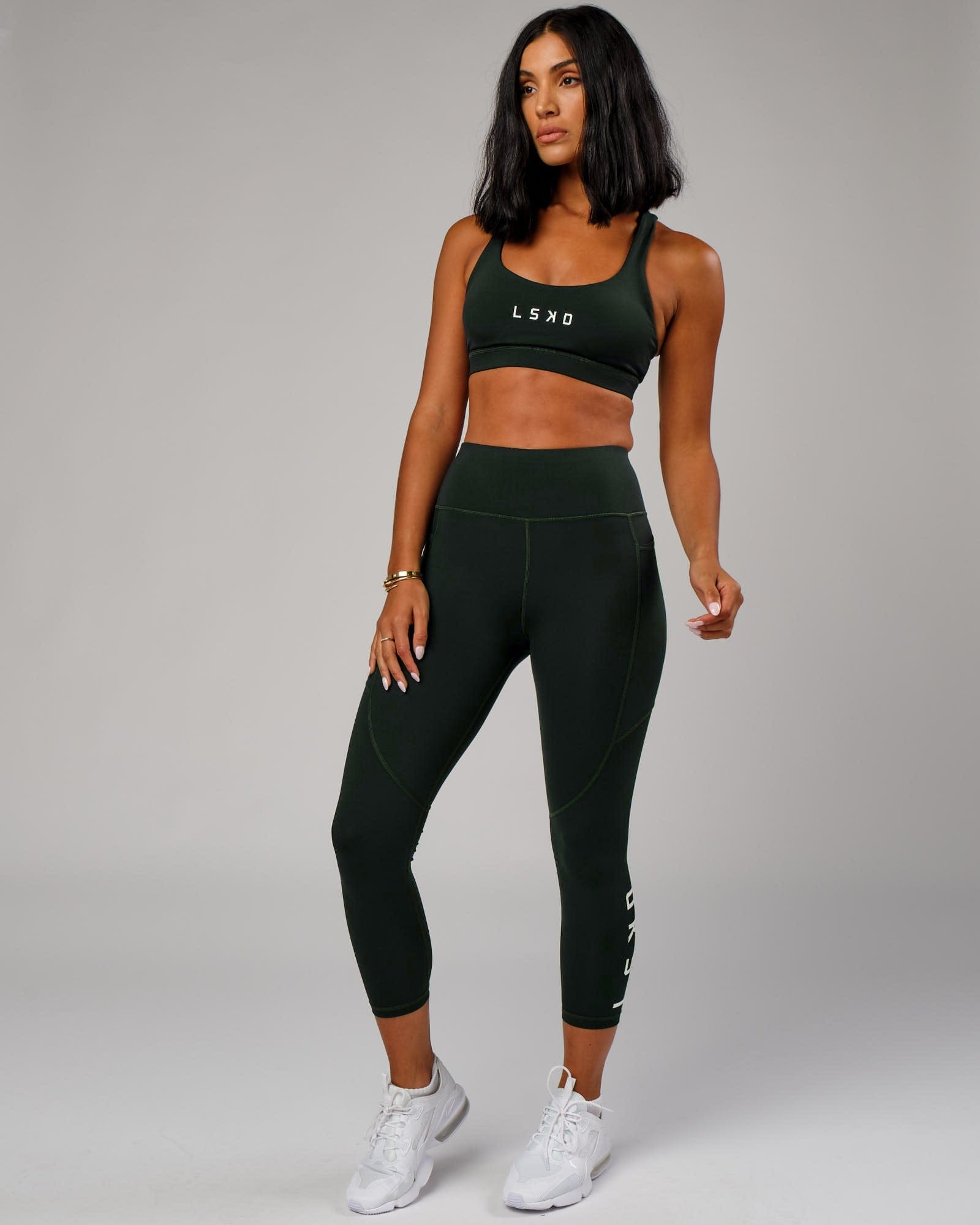 Model wearing Rep 7/8 Length Tight - Forest