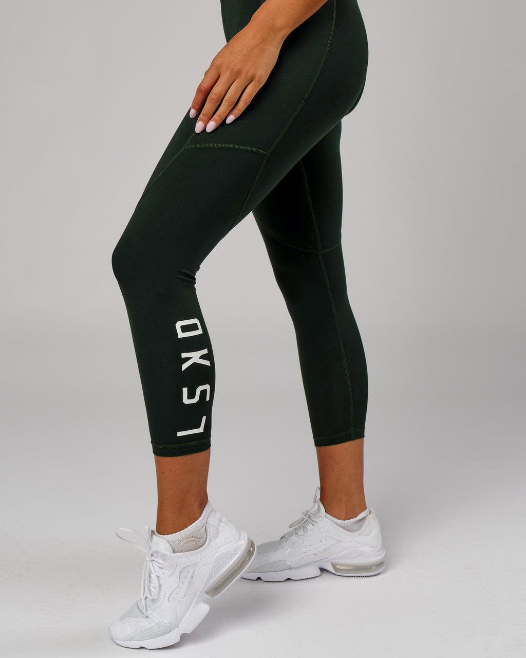 Model wearing Rep 7/8 Length Tight - Forest