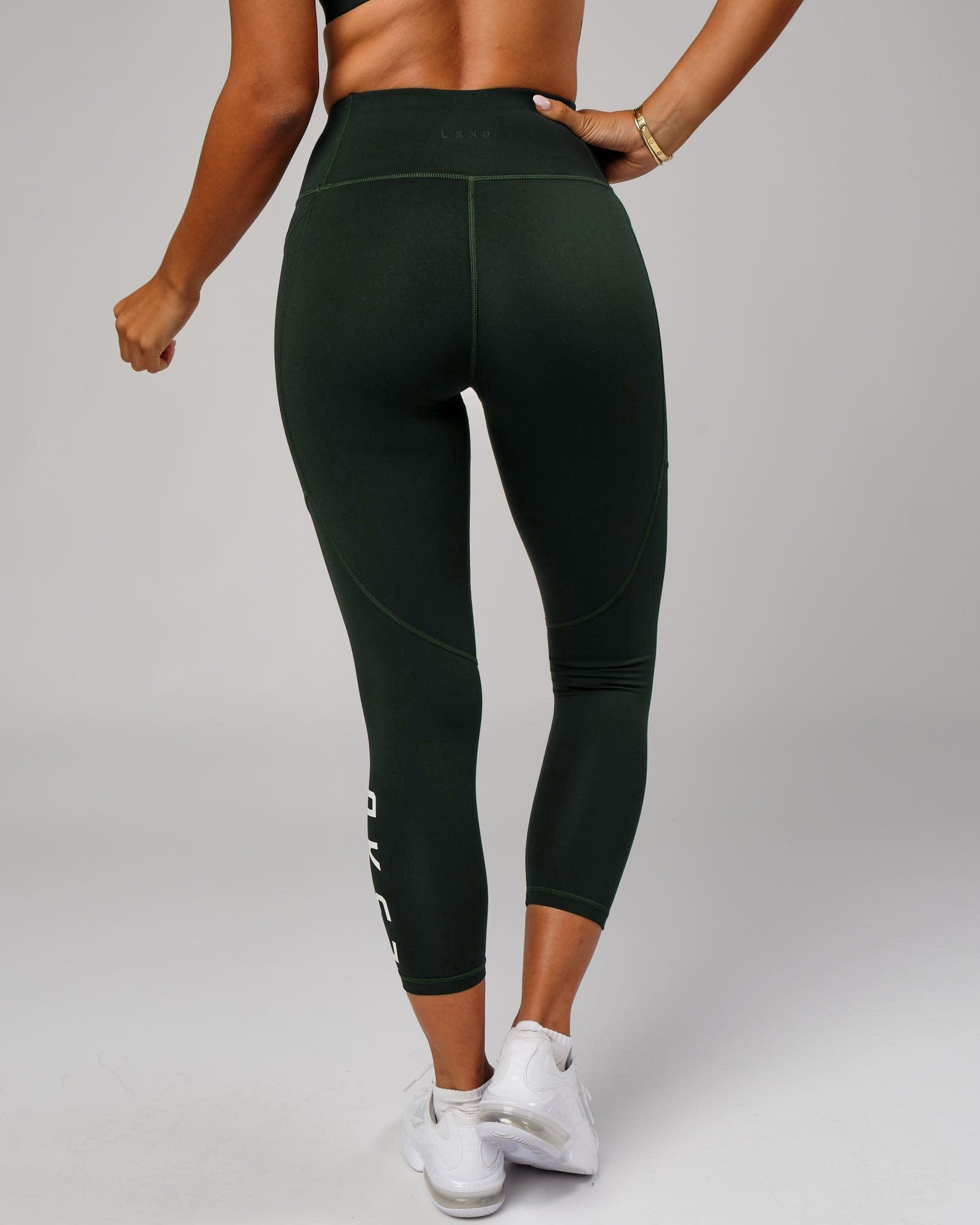 Model wearing Rep 7/8 Length Tight - Forest