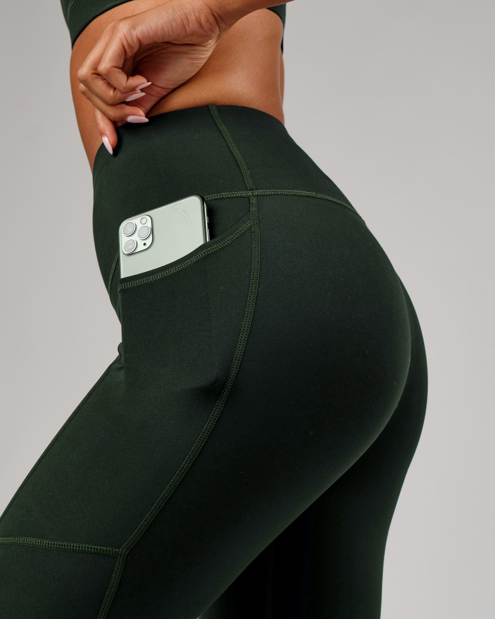 Model wearing Rep 7/8 Length Tight - Forest