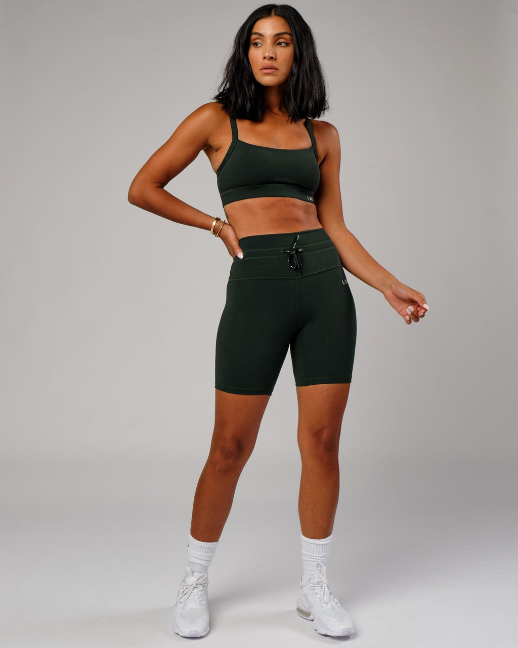 Model wearing Lace Up Mid Short Tight - Forest