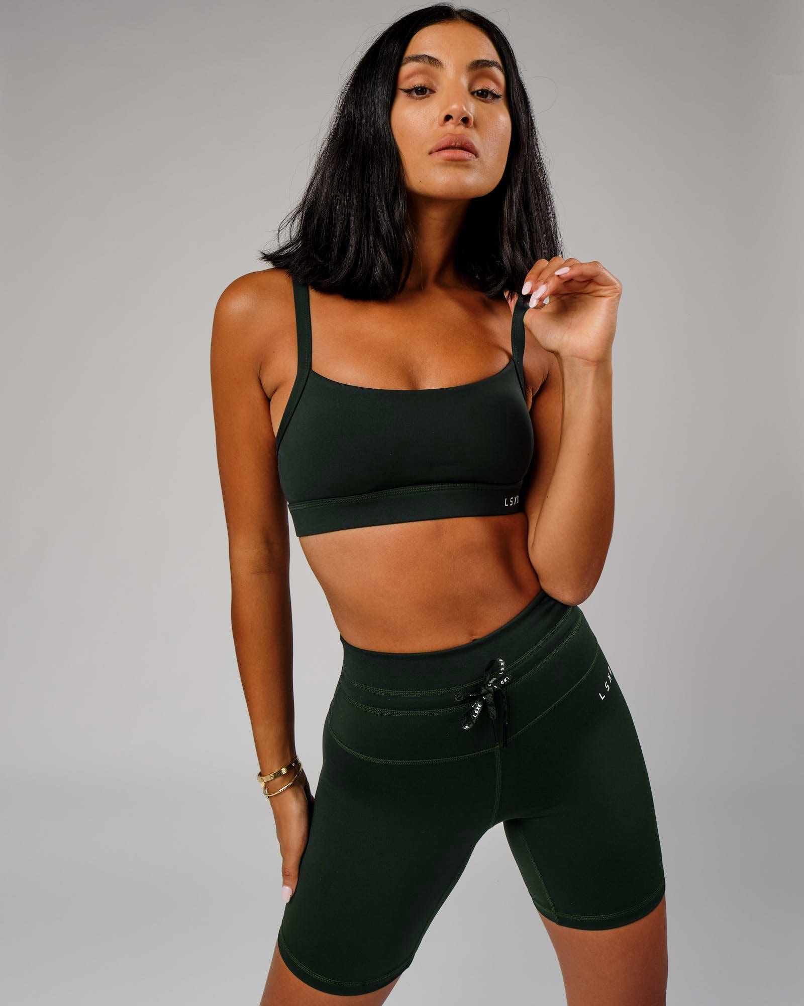 Model wearing Lace Up Mid Short Tight - Forest