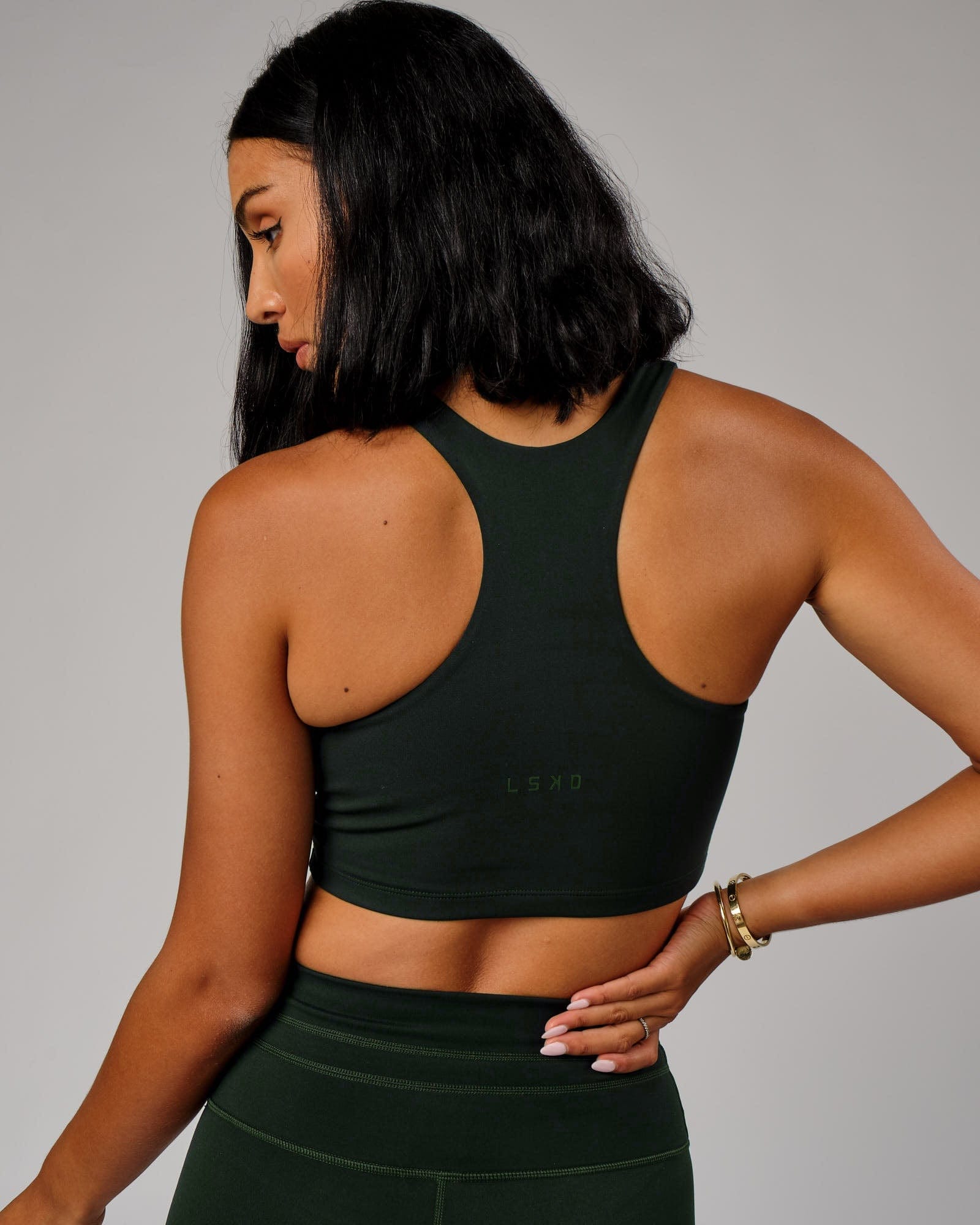 Model wearing Reformer Sport Tank - Forest