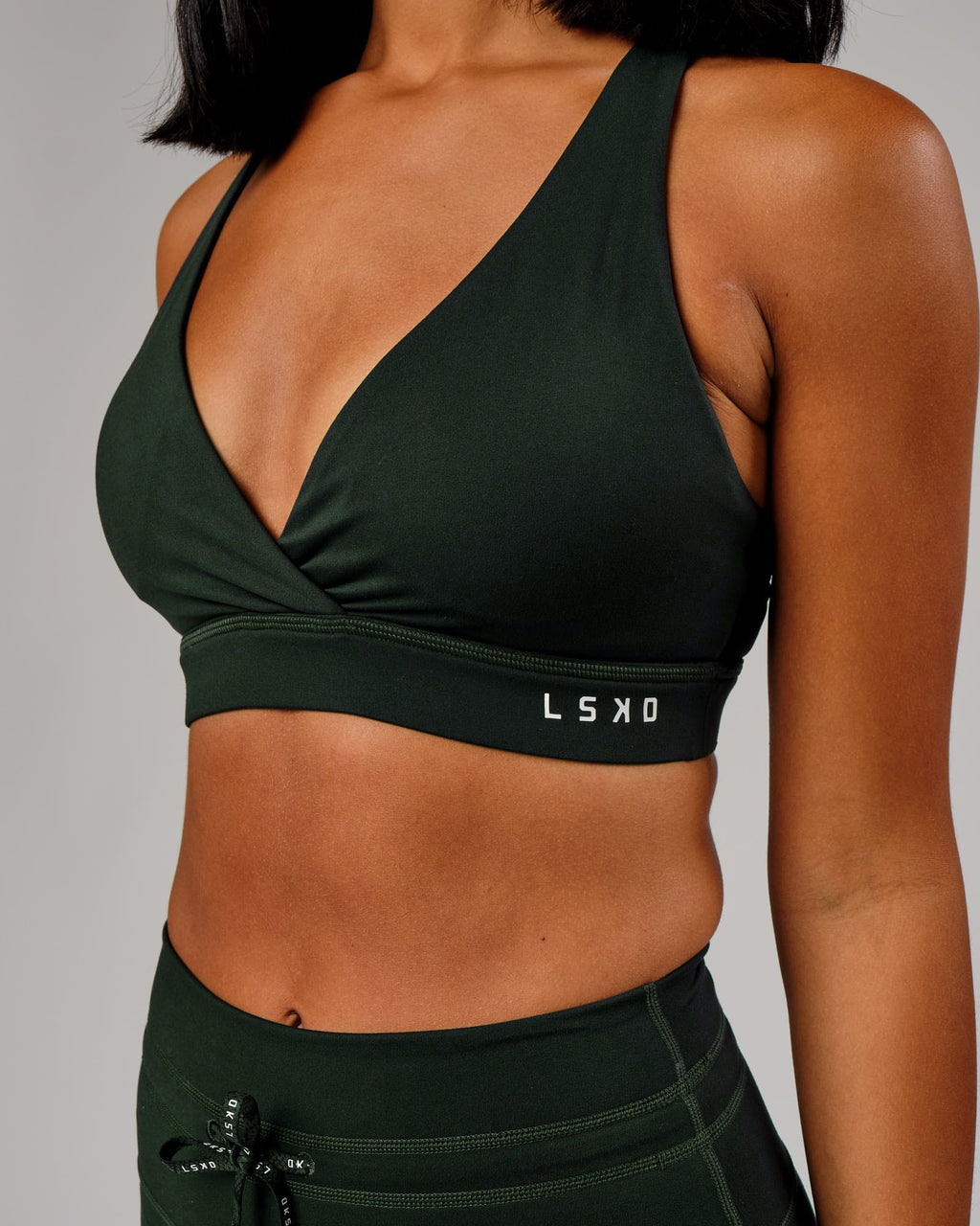 Model wearing Ignite Sports Bra - Forest