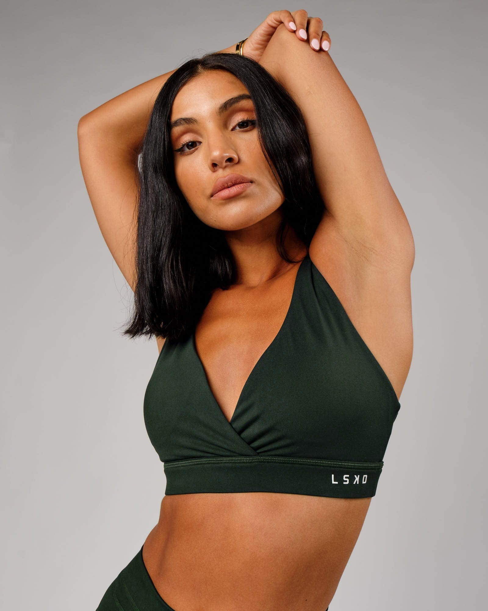 Model wearing Ignite Sports Bra - Forest