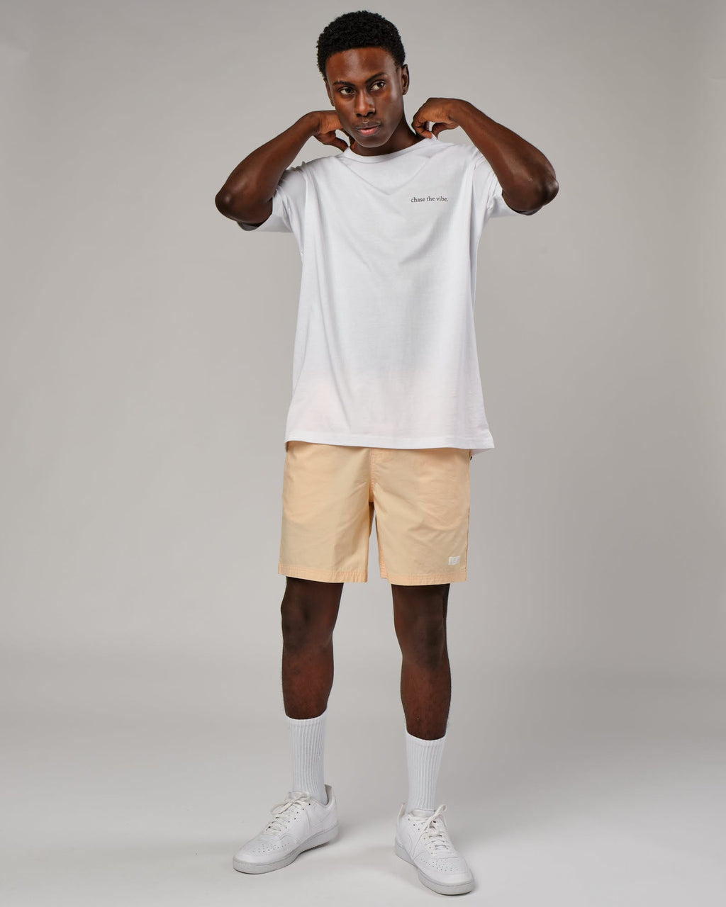 Model wearing Daily Short - Pastel Orange