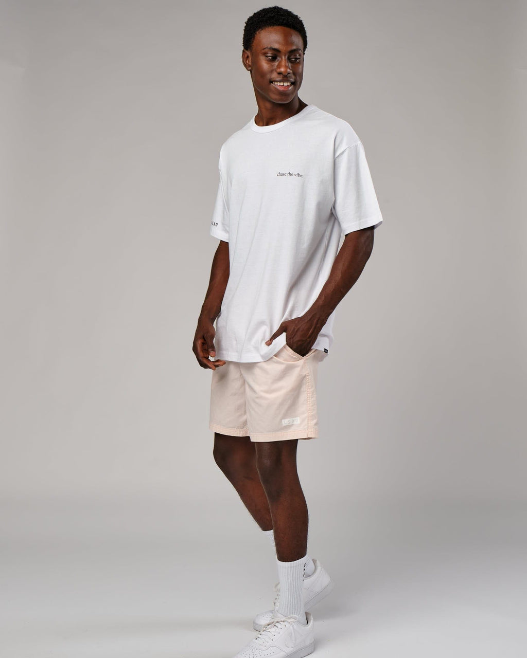 Model wearing Daily Short - Pastel Pink