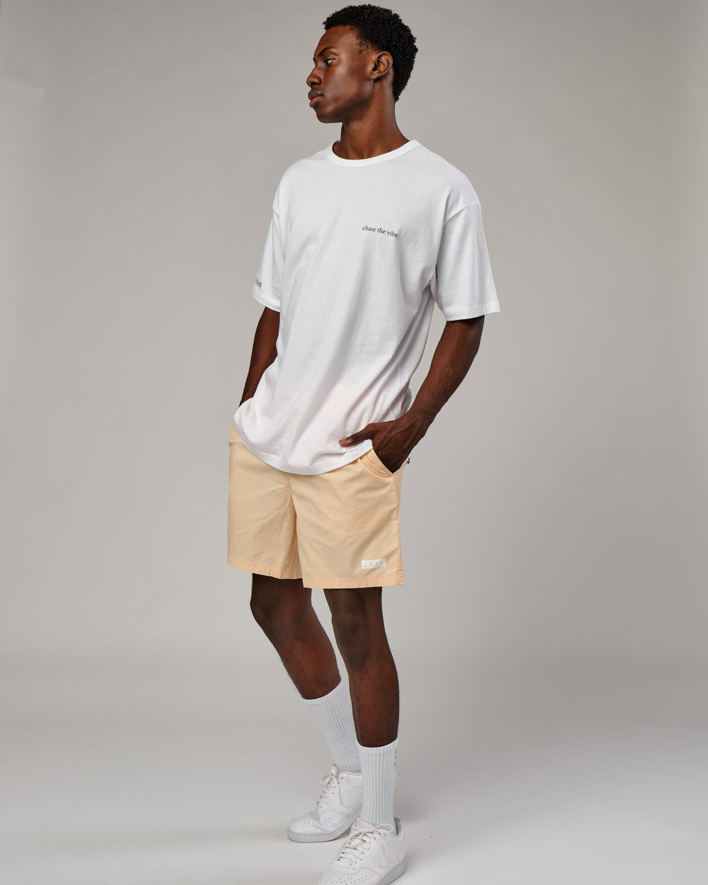 Model wearing Daily Short - Pastel Orange