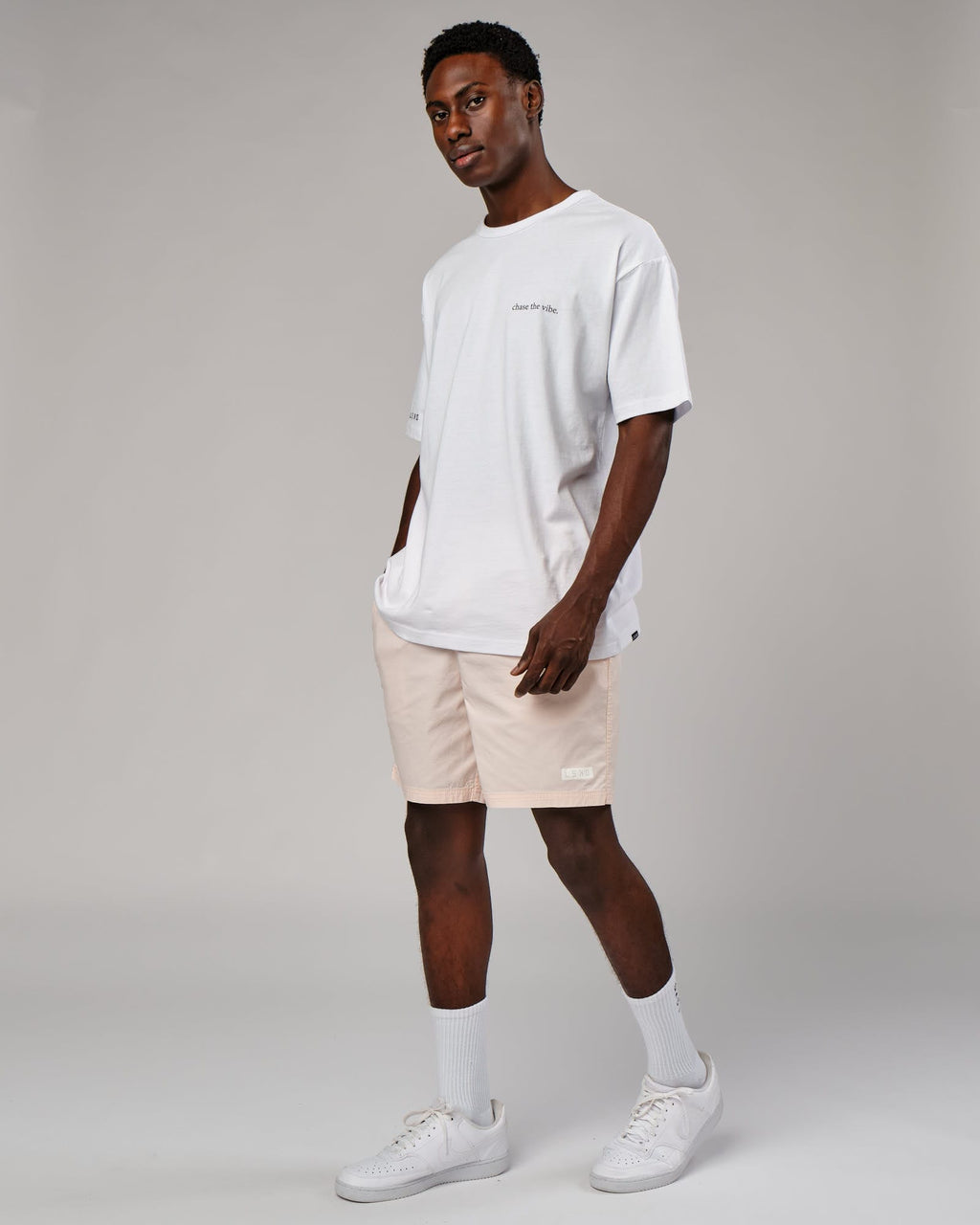 Model wearing Daily Short - Pastel Pink