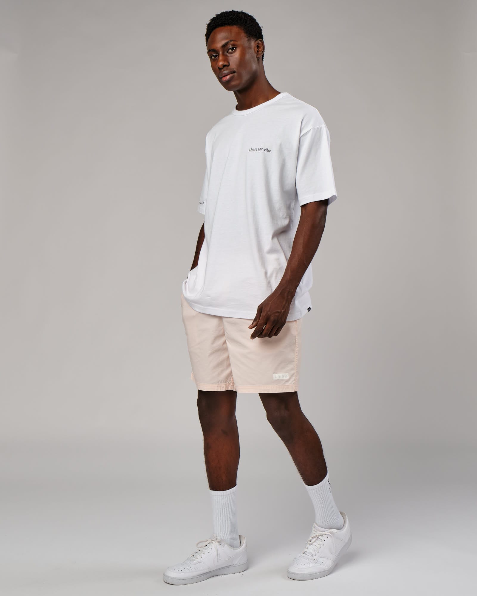 Model wearing Daily Short - Pastel Pink