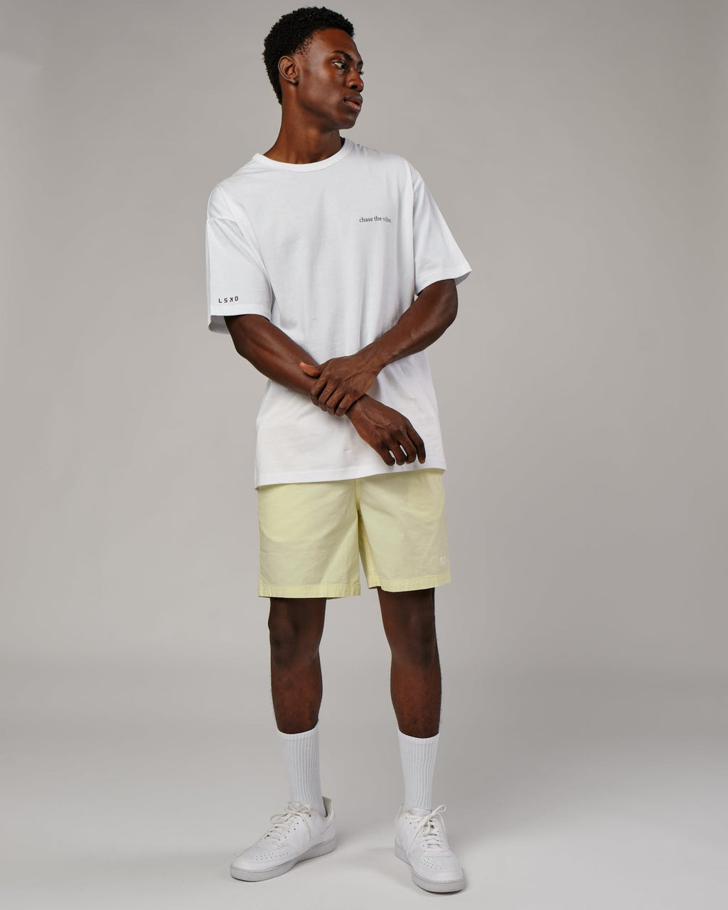 Model wearing Daily Short - Pastel Lime