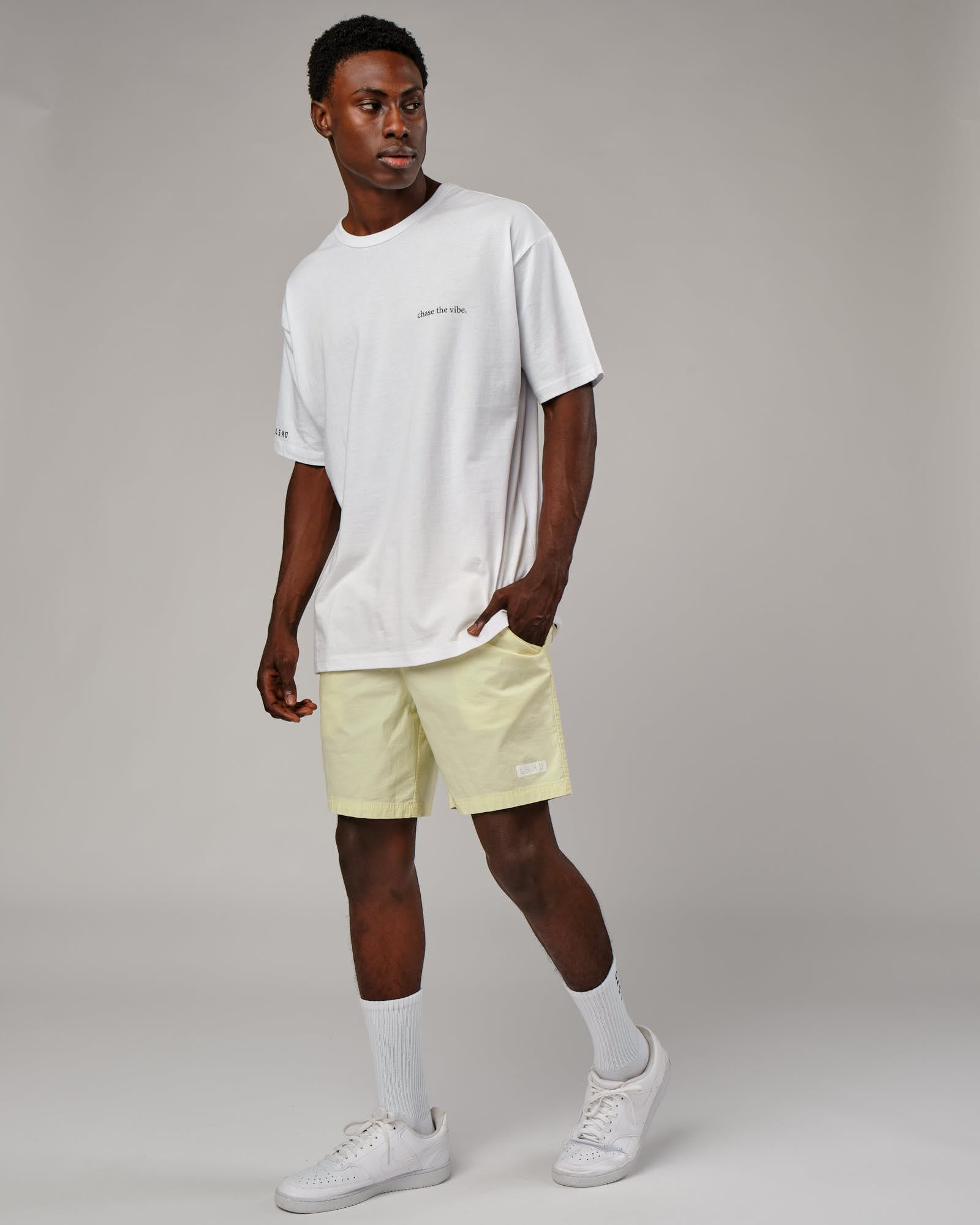 Model wearing Daily Short - Pastel Lime