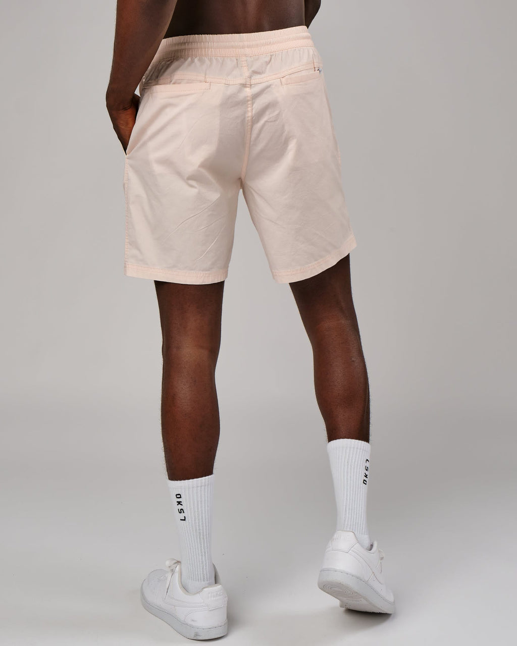 Model wearing Daily Short - Pastel Pink