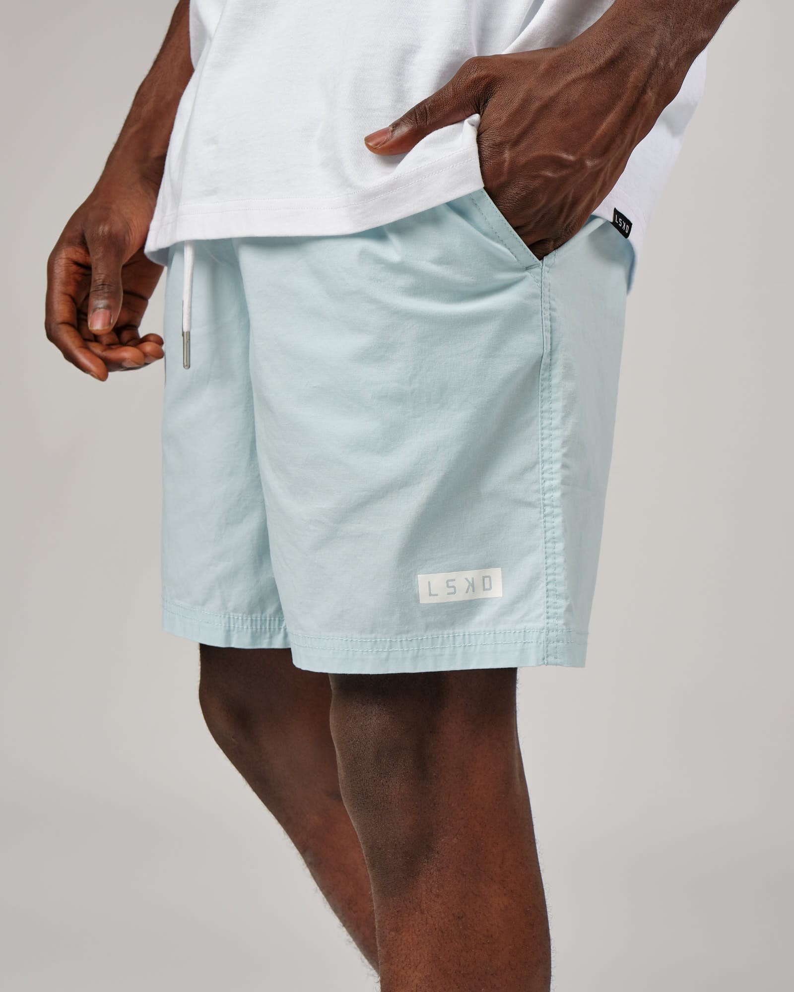 Model wearing Daily Short - Pastel Aqua