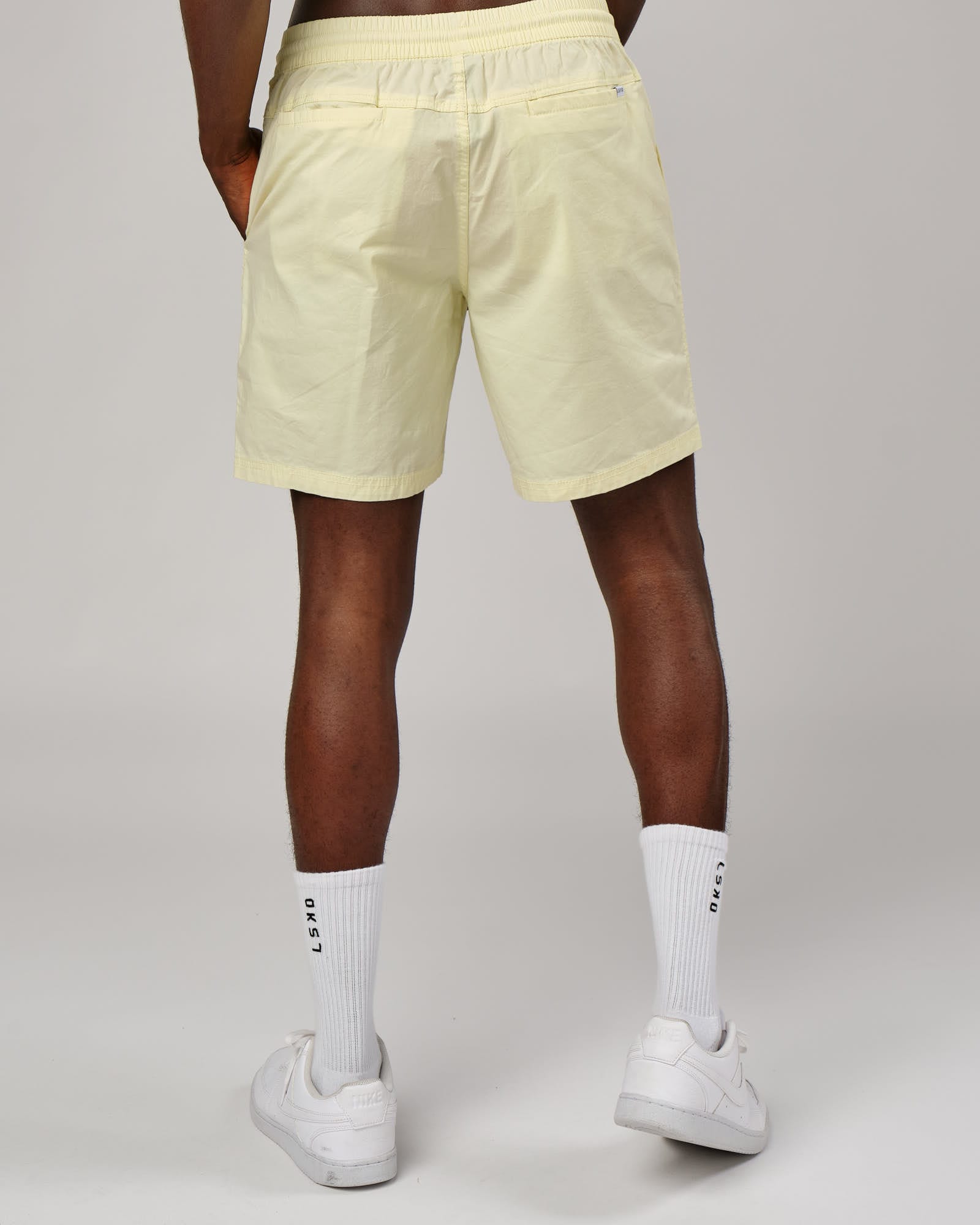 Model wearing Daily Short - Pastel Lime