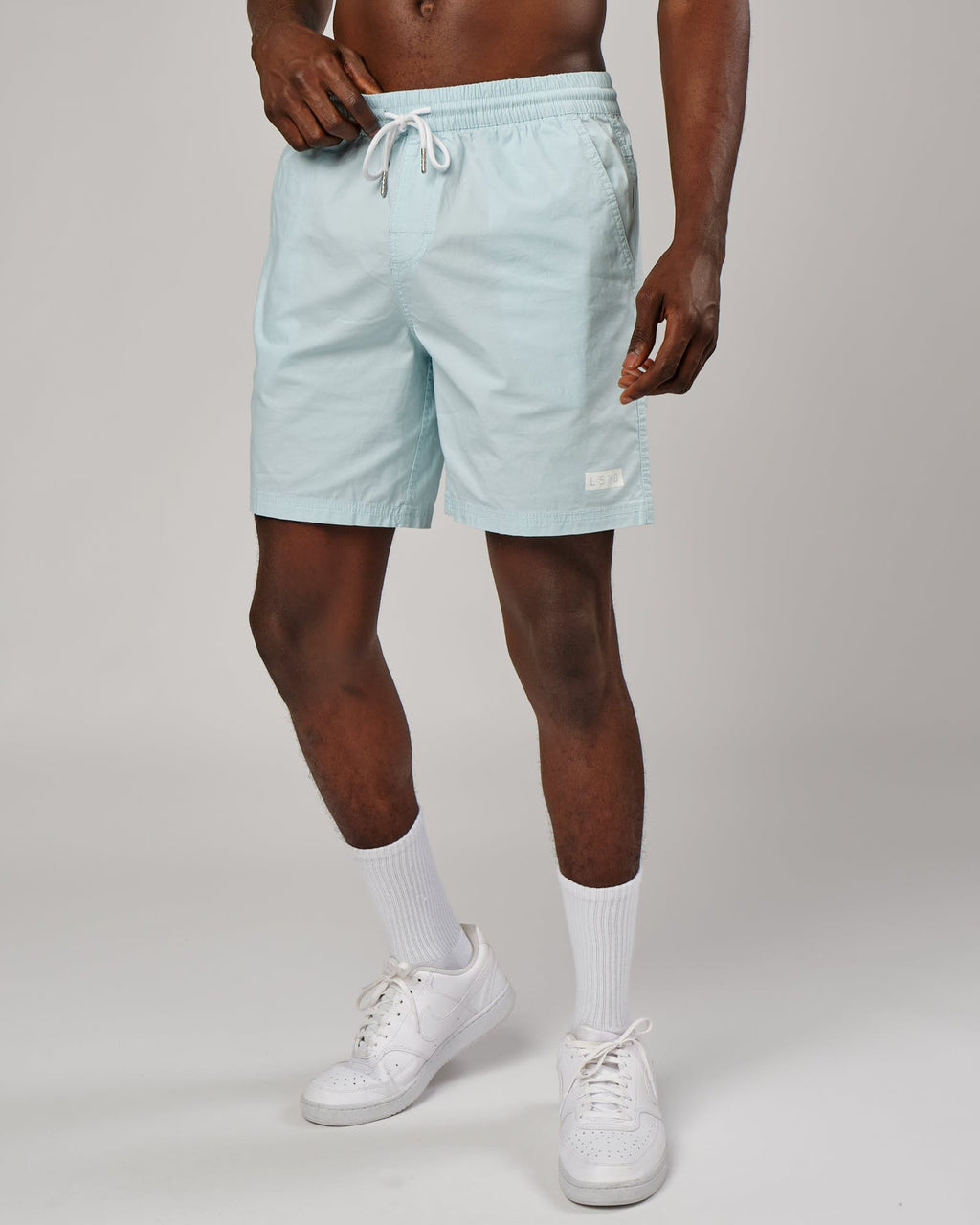 Model wearing Daily Short - Pastel Aqua