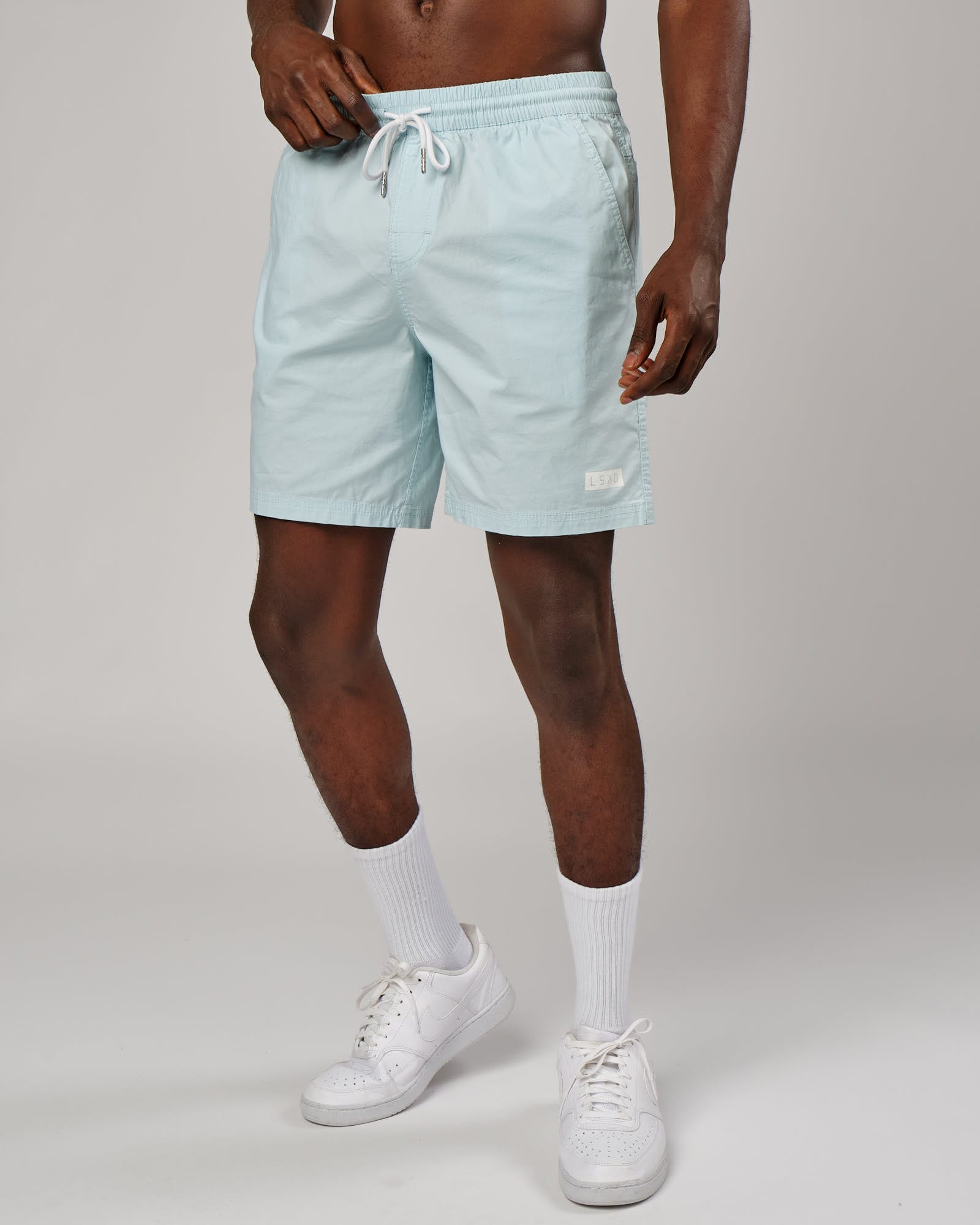 Model wearing Daily Short - Pastel Aqua