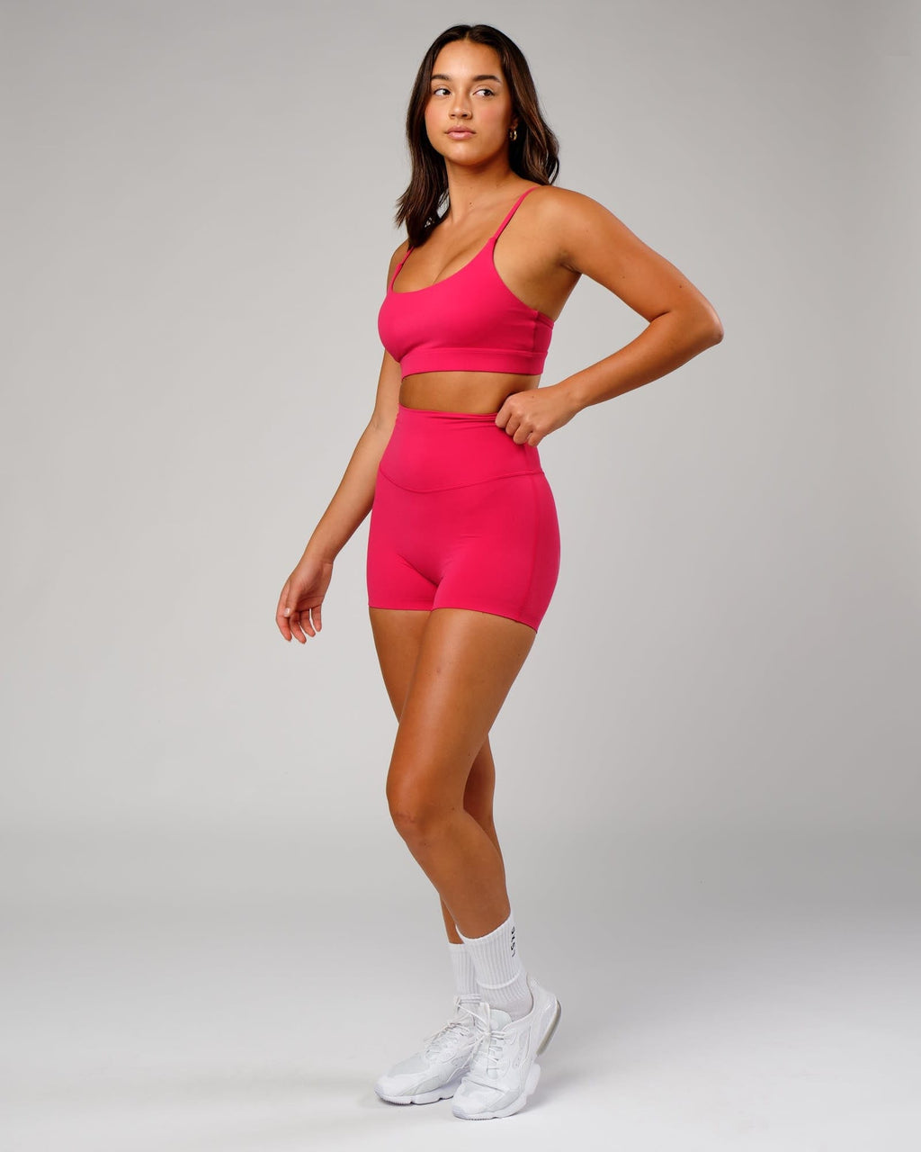 Model wearing Elixir X-Short Tight - Boysenberry No Logo