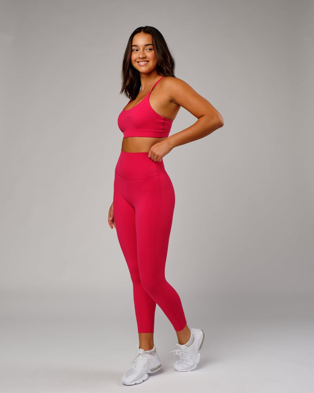 Model wearing Elixir 7/8 Length Tight - Boysenberry No Logo