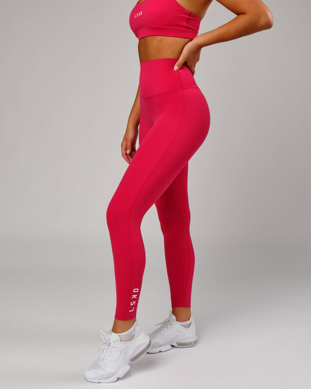 Model wearing Elixir Full Length Tight - Boysenberry