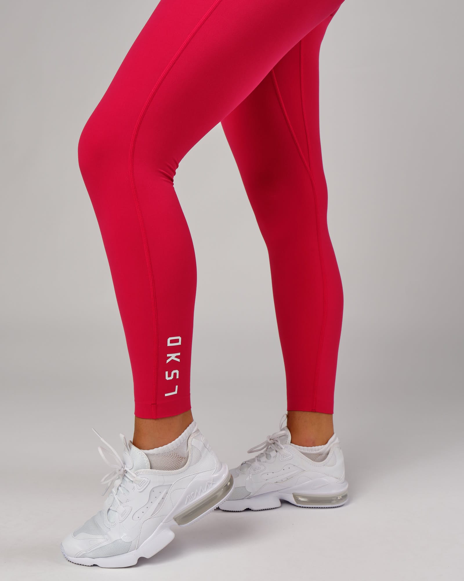 Model wearing Elixir Full Length Tight - Boysenberry