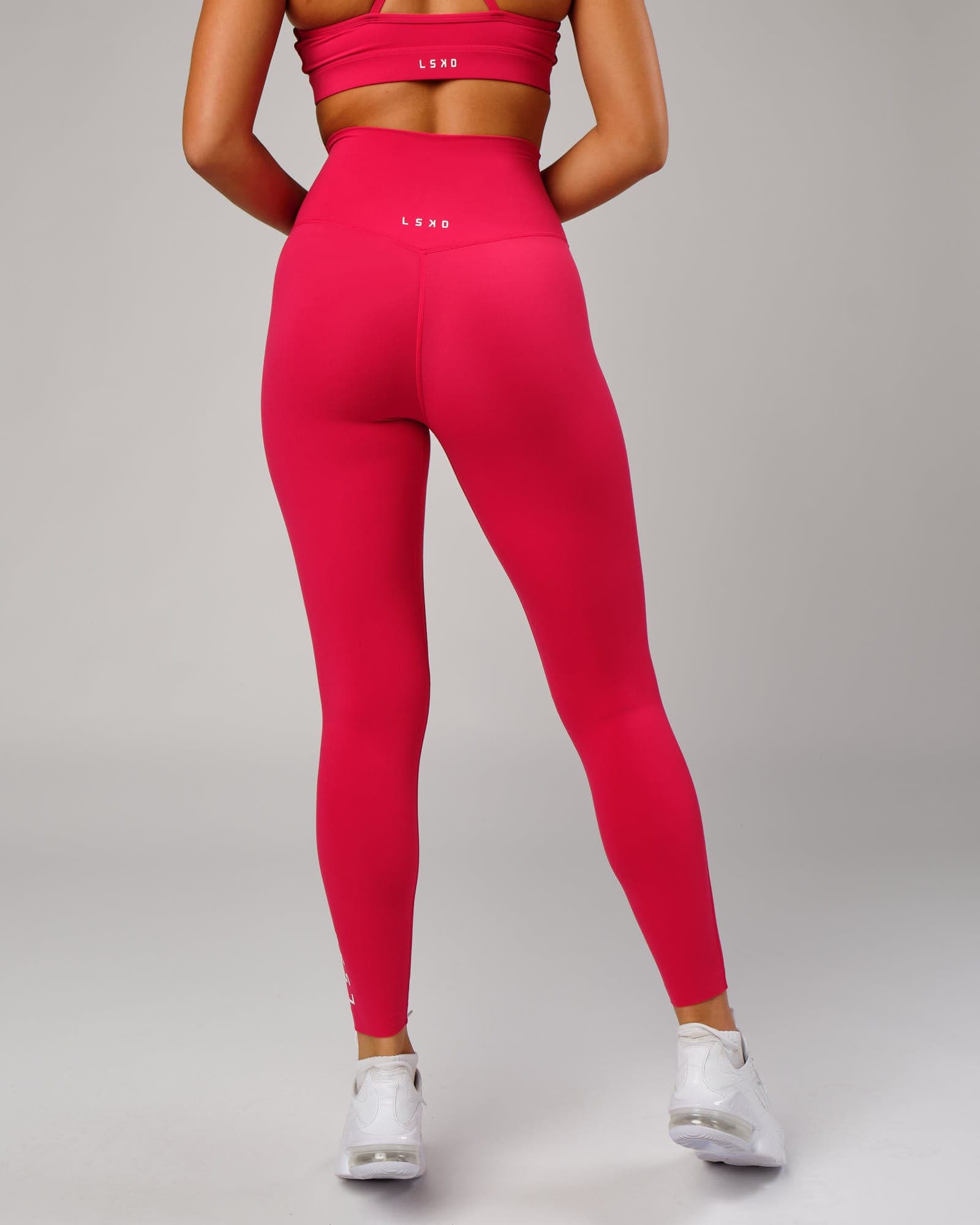 Model wearing Elixir Full Length Tight - Boysenberry