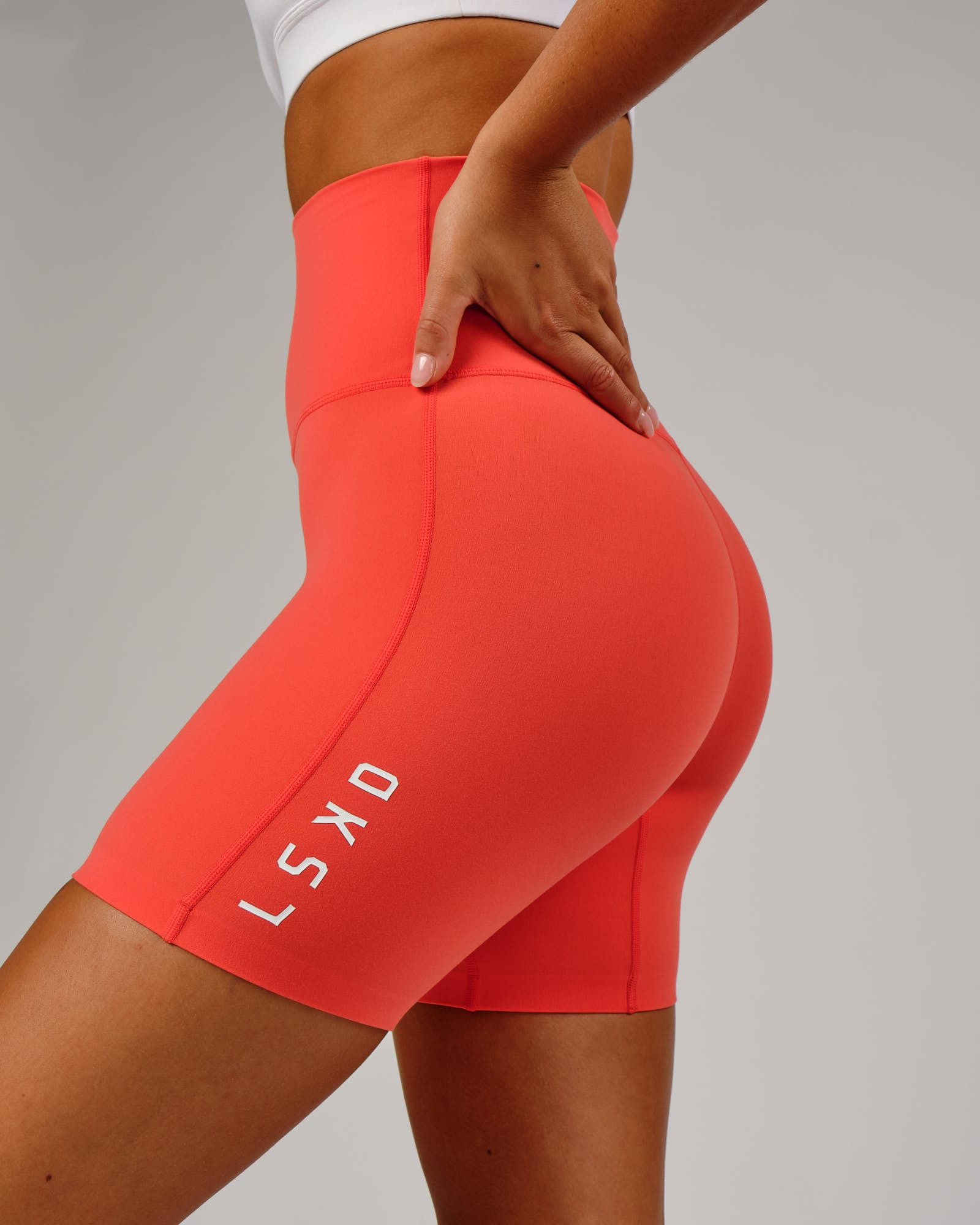 Model wearing Elixir Mid Short Tight - Fruit Punch