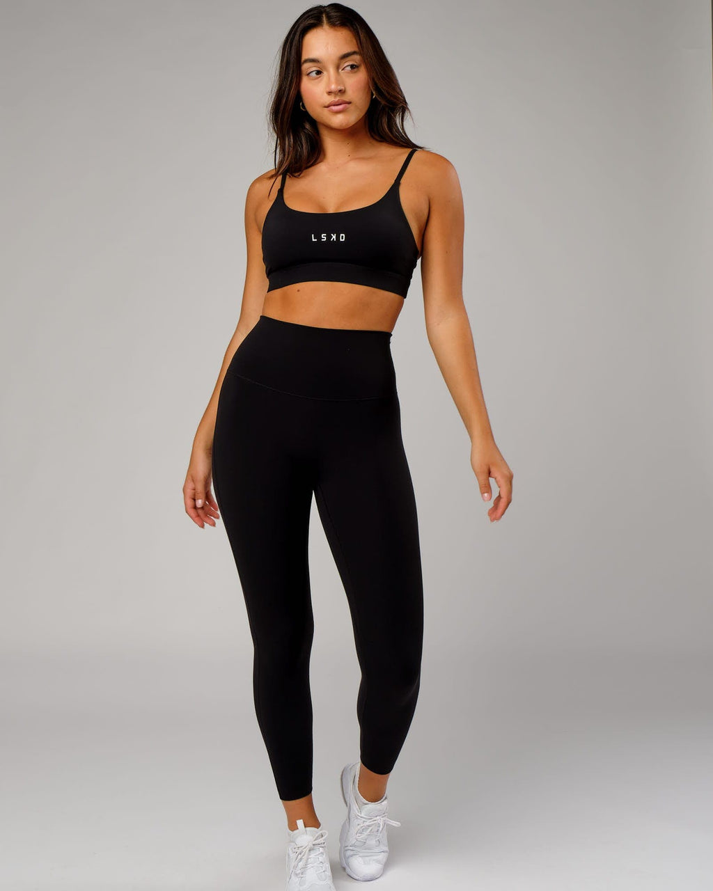 Model wearing Elixir 7/8 Length Tight - Black