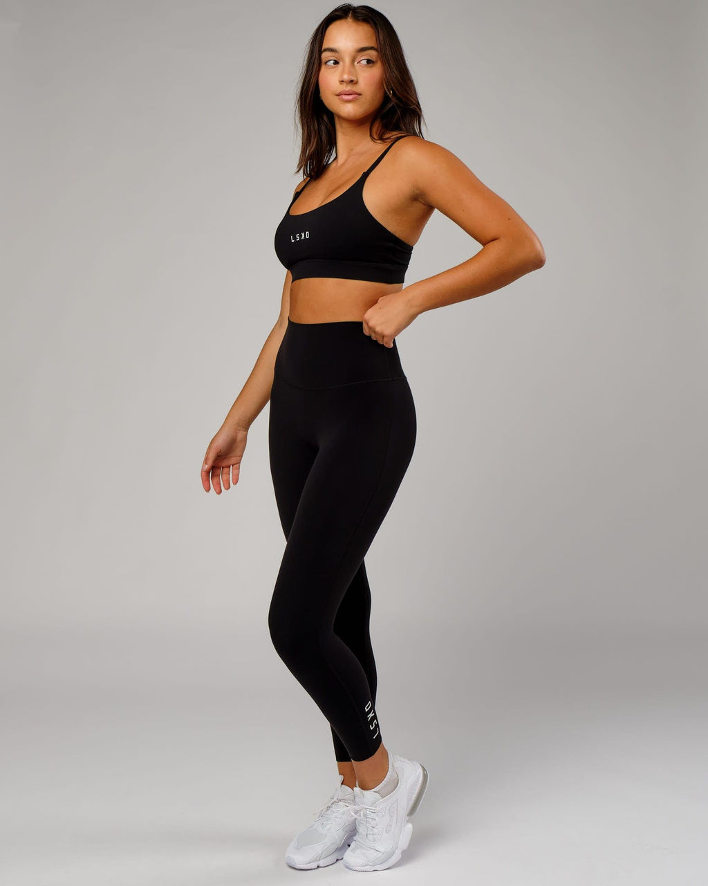 Model wearing Elixir 7/8 Length Tight - Black