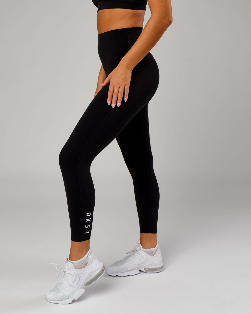 Model wearing Elixir 7/8 Length Tight - Black