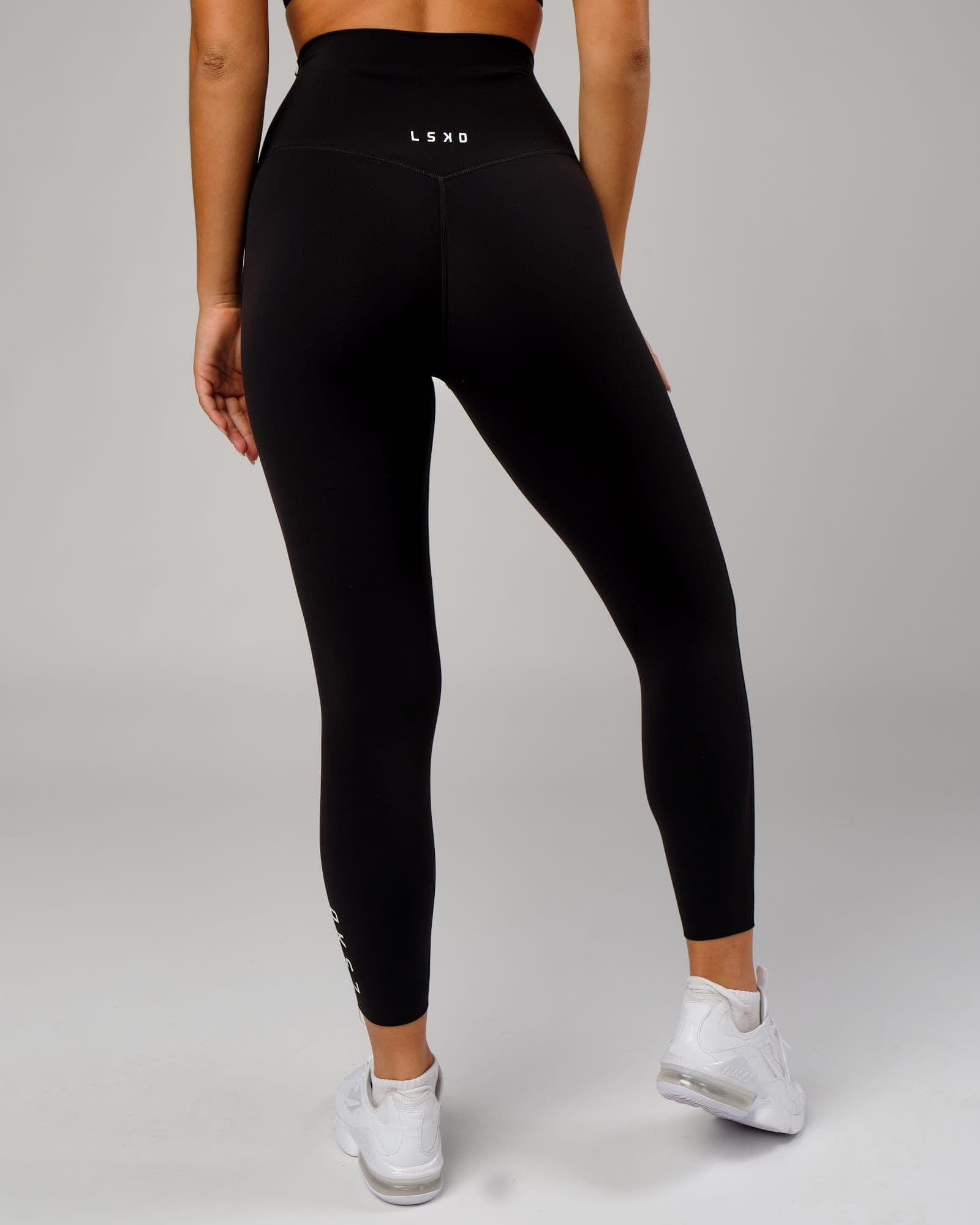 Model wearing Elixir 7/8 Length Tight - Black