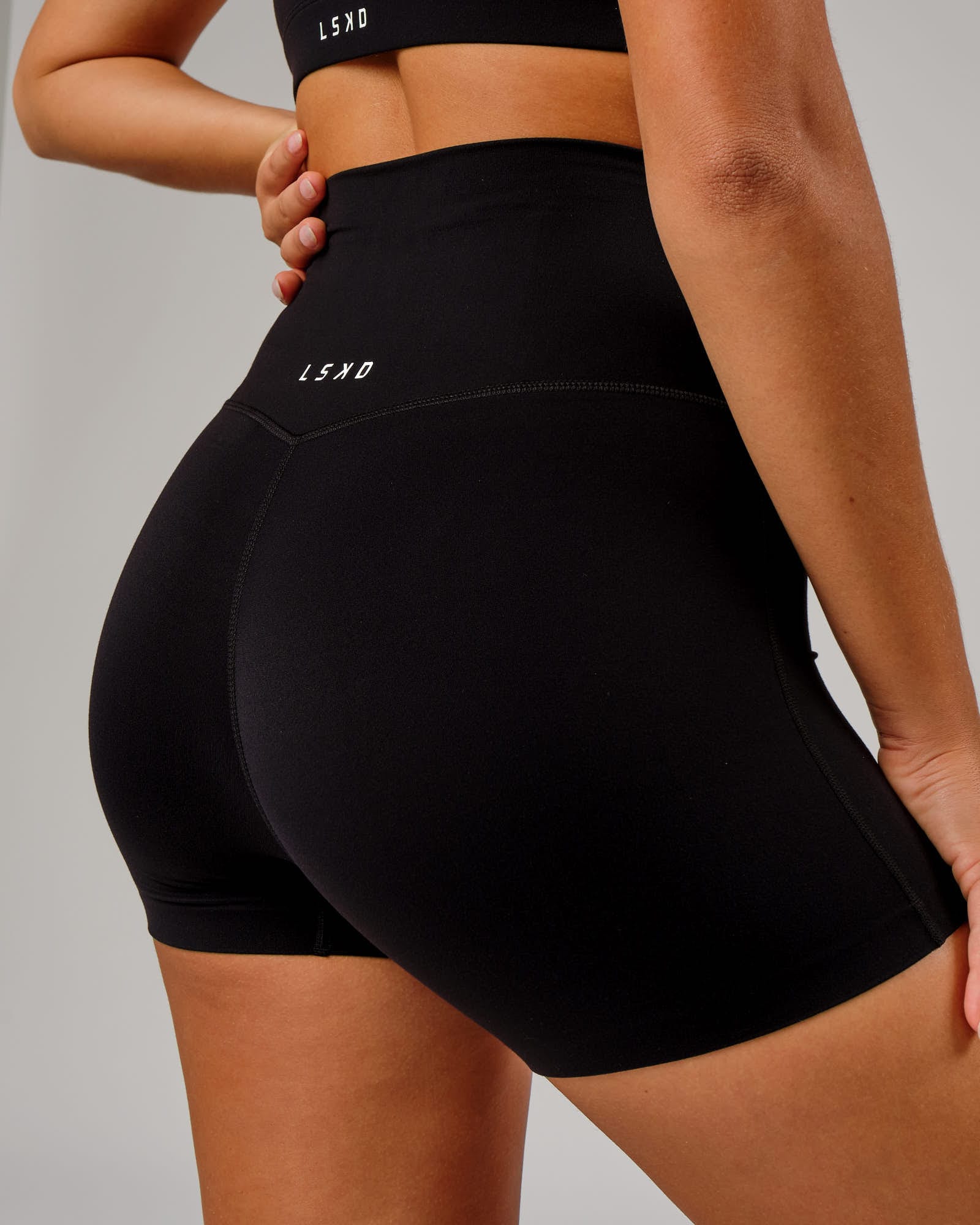 Model wearing Elixir X Short Tight - Black