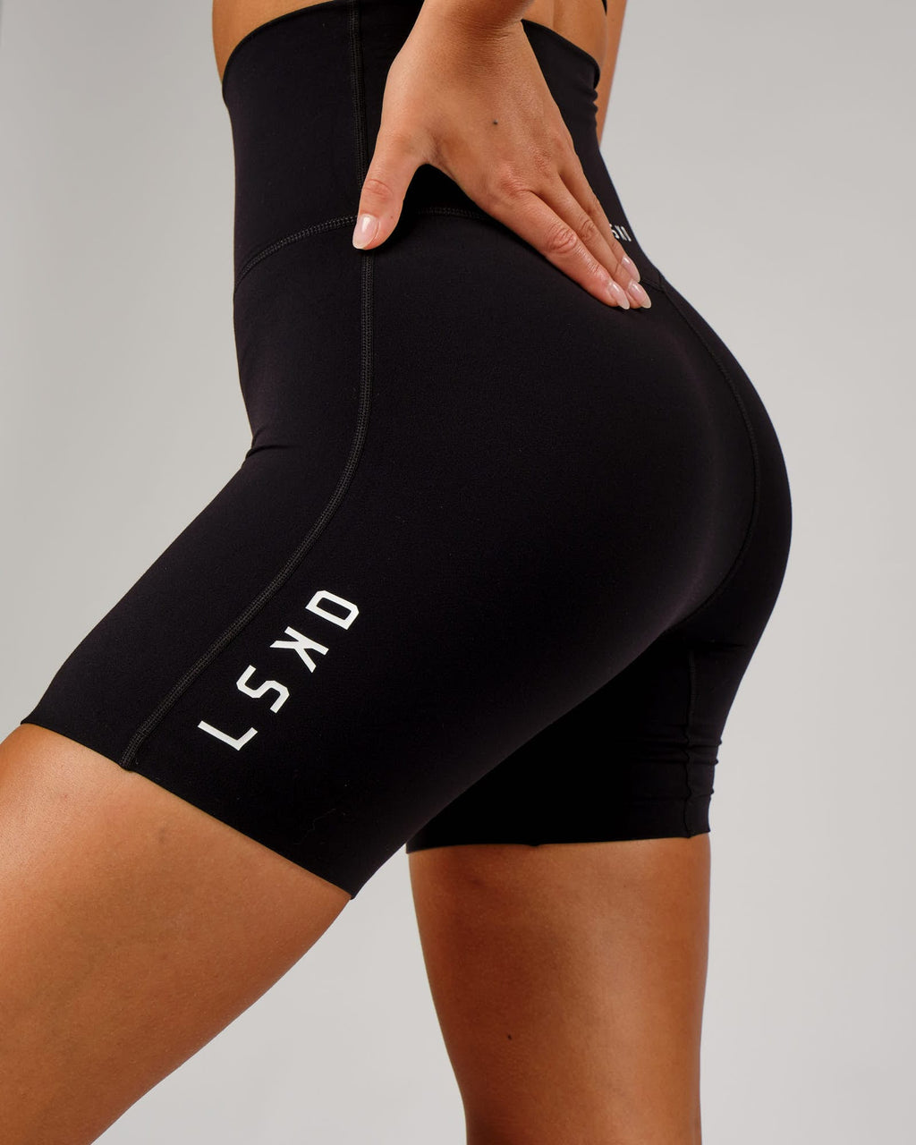 Model wearing Elixir Mid Short Tight - Black