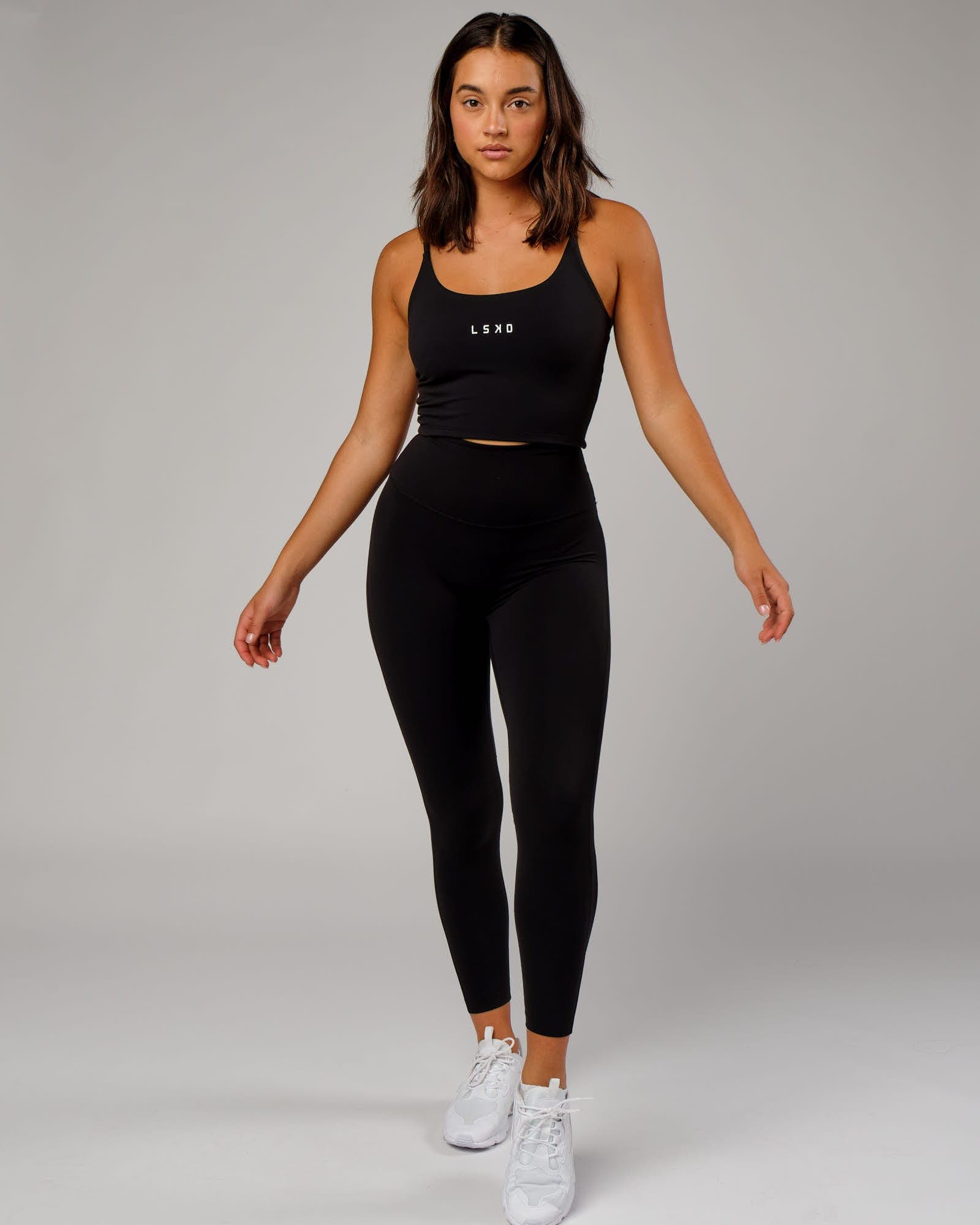 Model wearing Elixir Full Length Tight - Black