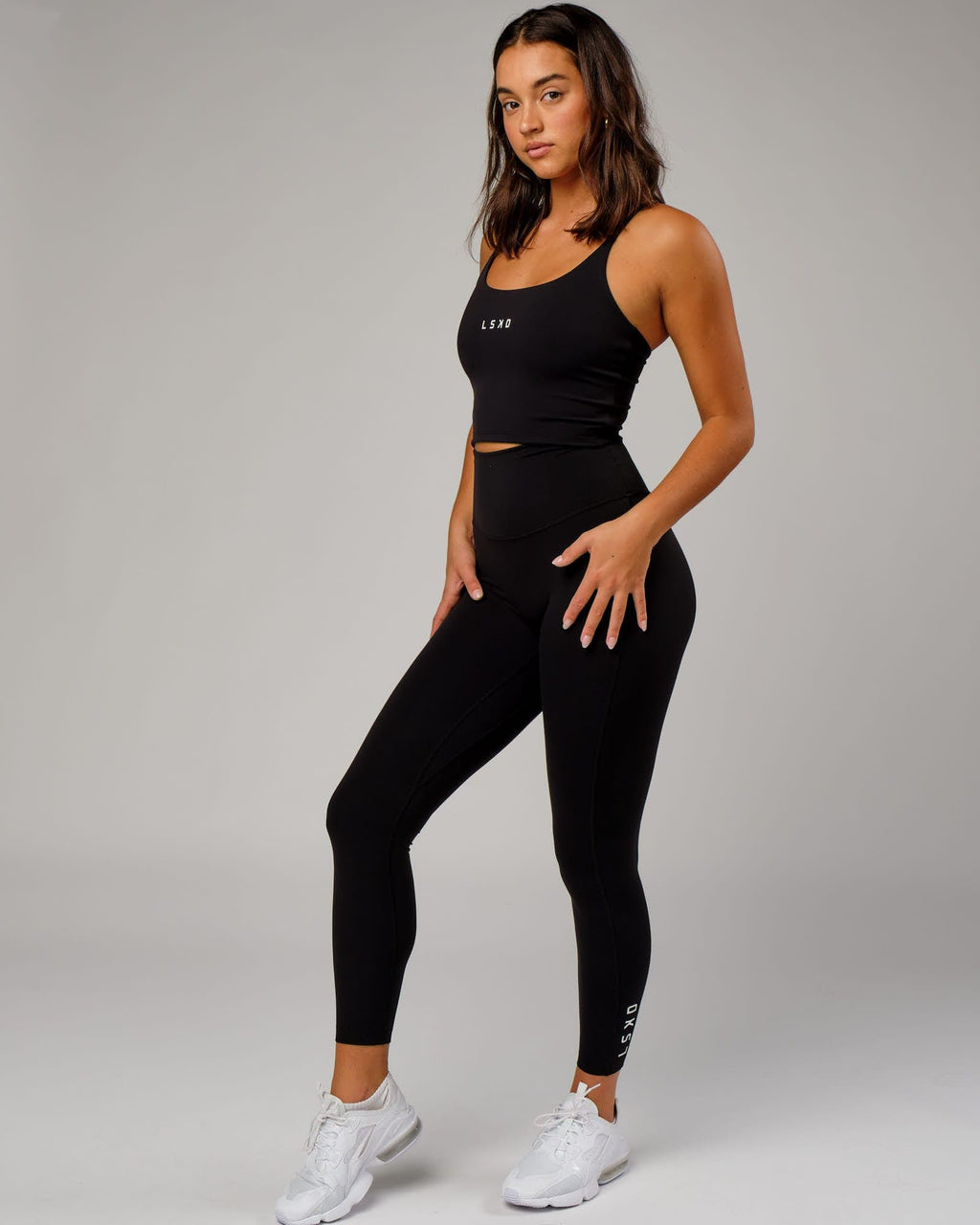 Model wearing Elixir Full Length Tight - Black