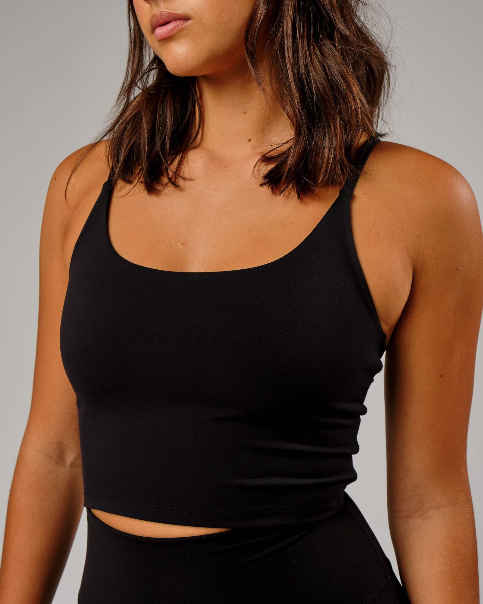 Model wearing Elixir Active Tank - Black