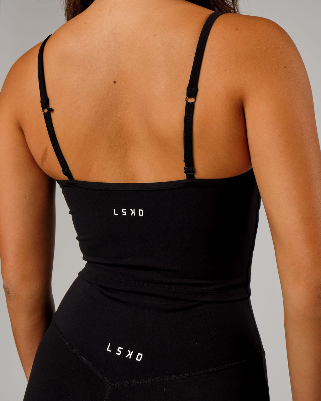 Model wearing Elixir Active Tank - Black