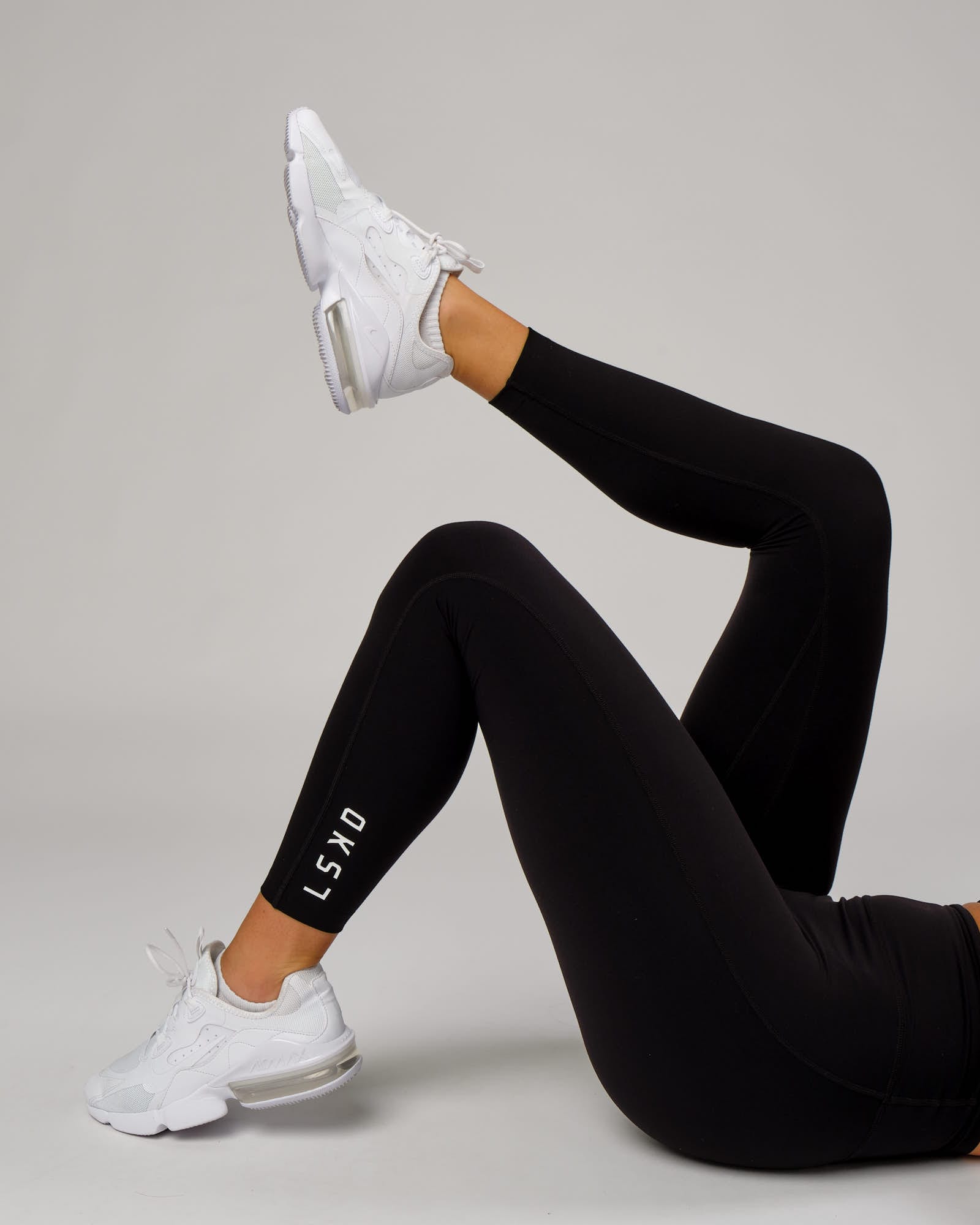 Model wearing Elixir Full Length Tight - Black