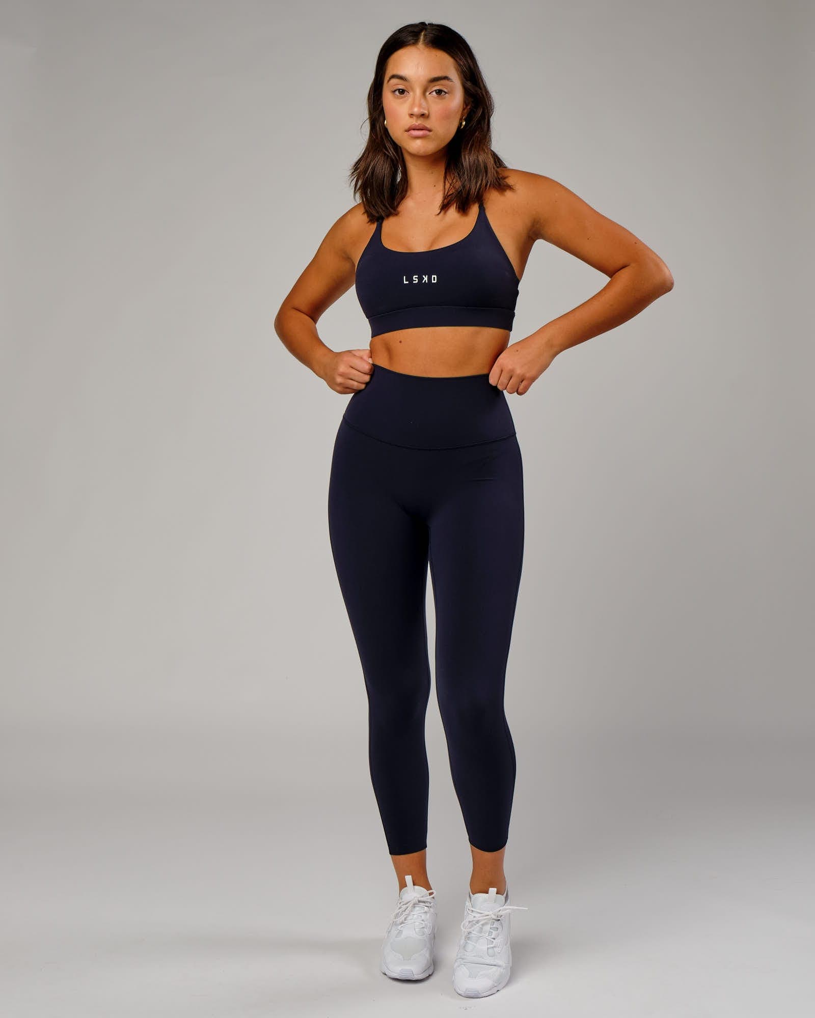 Model wearing Elixir 7/8 Length Tight - Navy