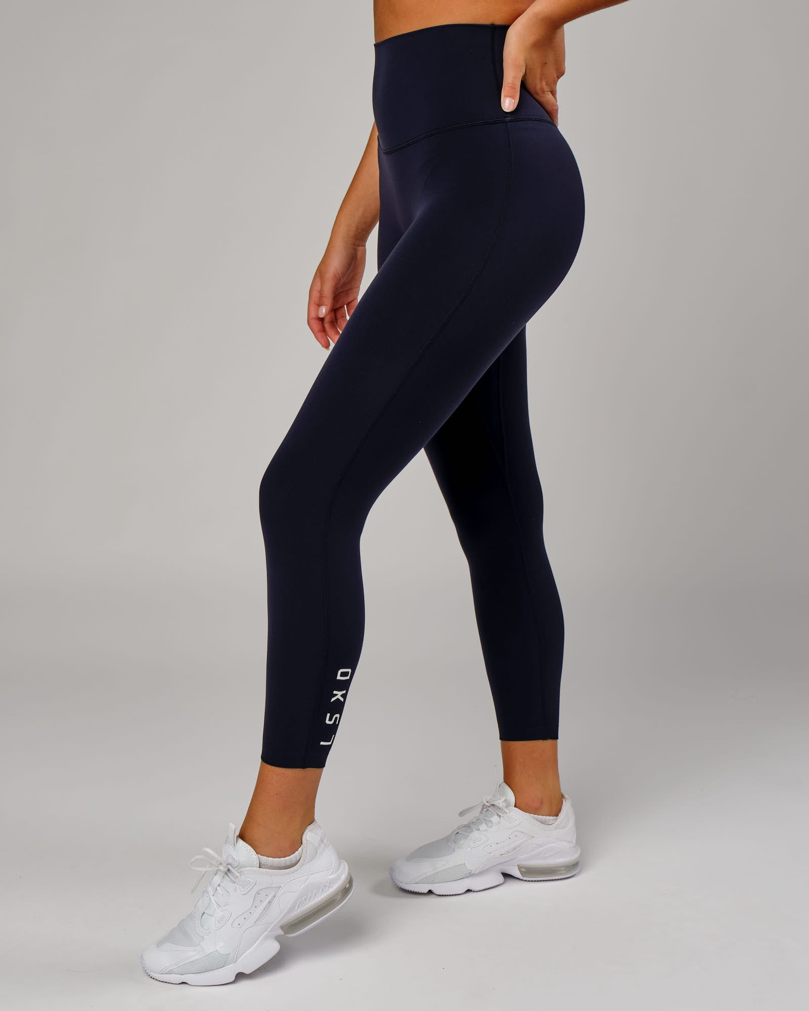 Model wearing Elixir 7/8 Length Tight - Navy