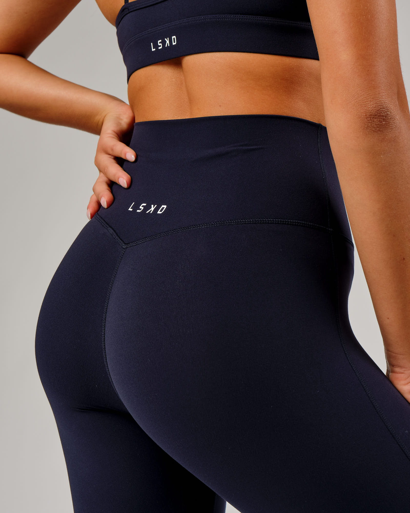 Model wearing Elixir 7/8 Length Tight - Navy