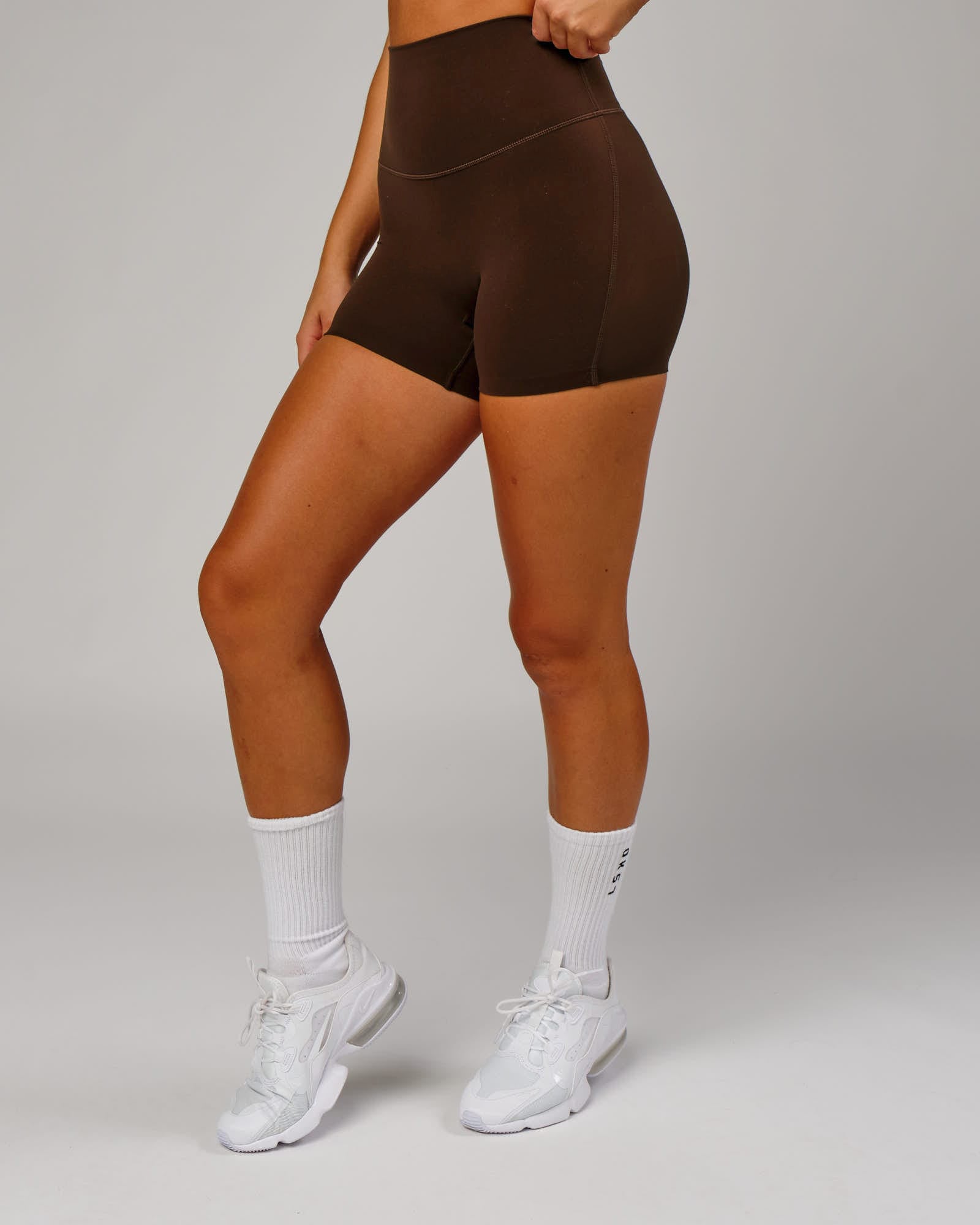 Model wearing Elixir X-Short Tight - Chocolate No Logo