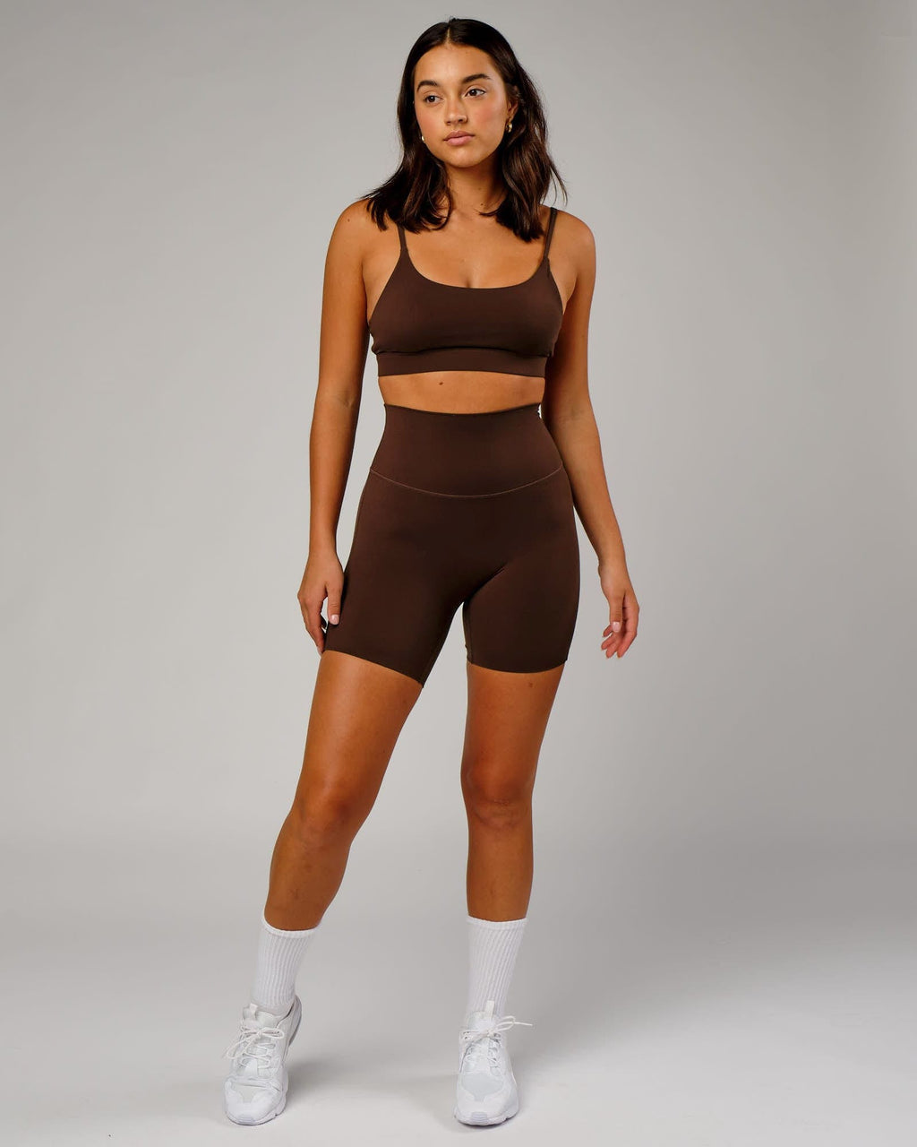 Model wearing Elixir Mid Short Tight - Chocolate No Logo
