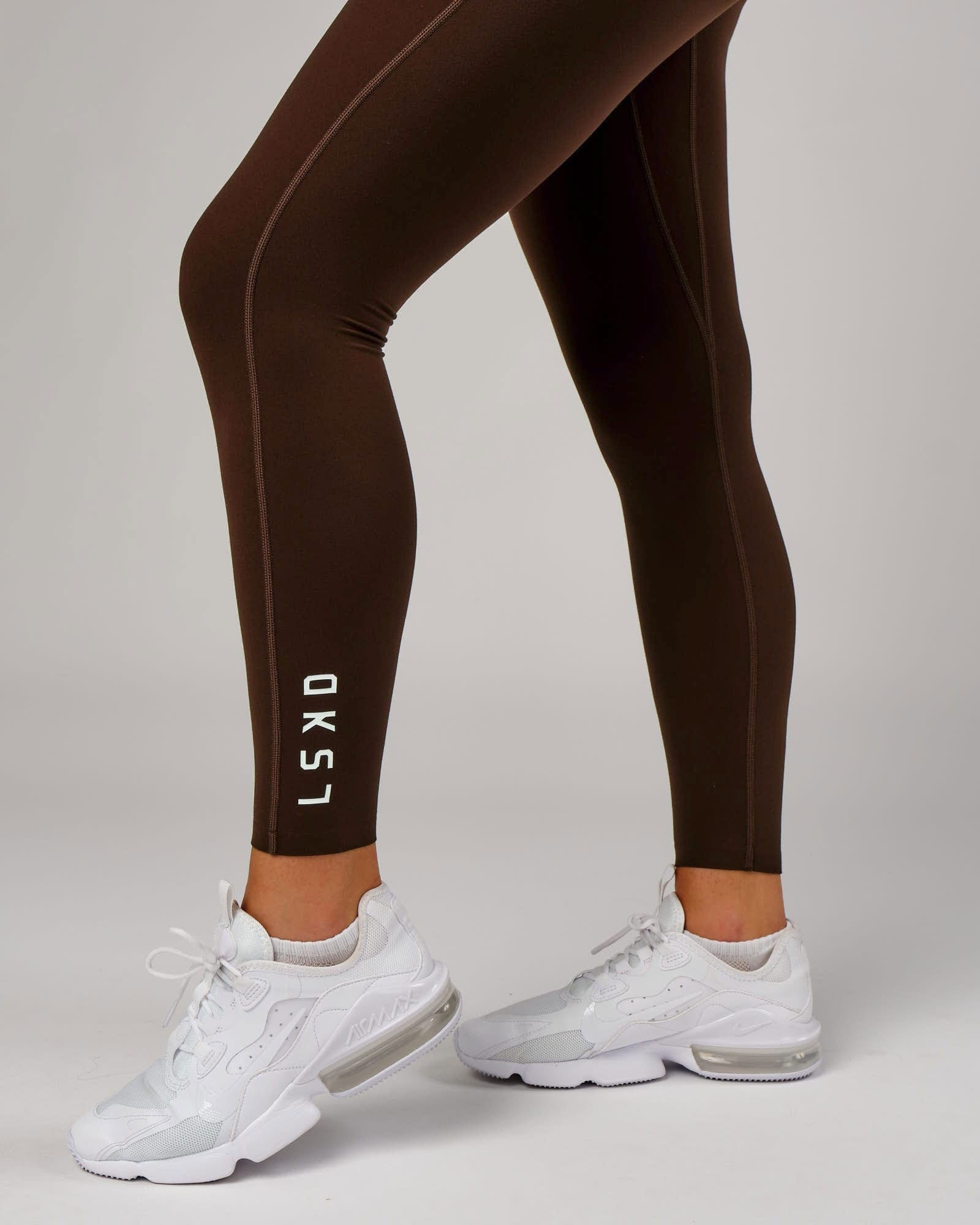 Model wearing Elixir 7/8 Length Tight - Chocolate