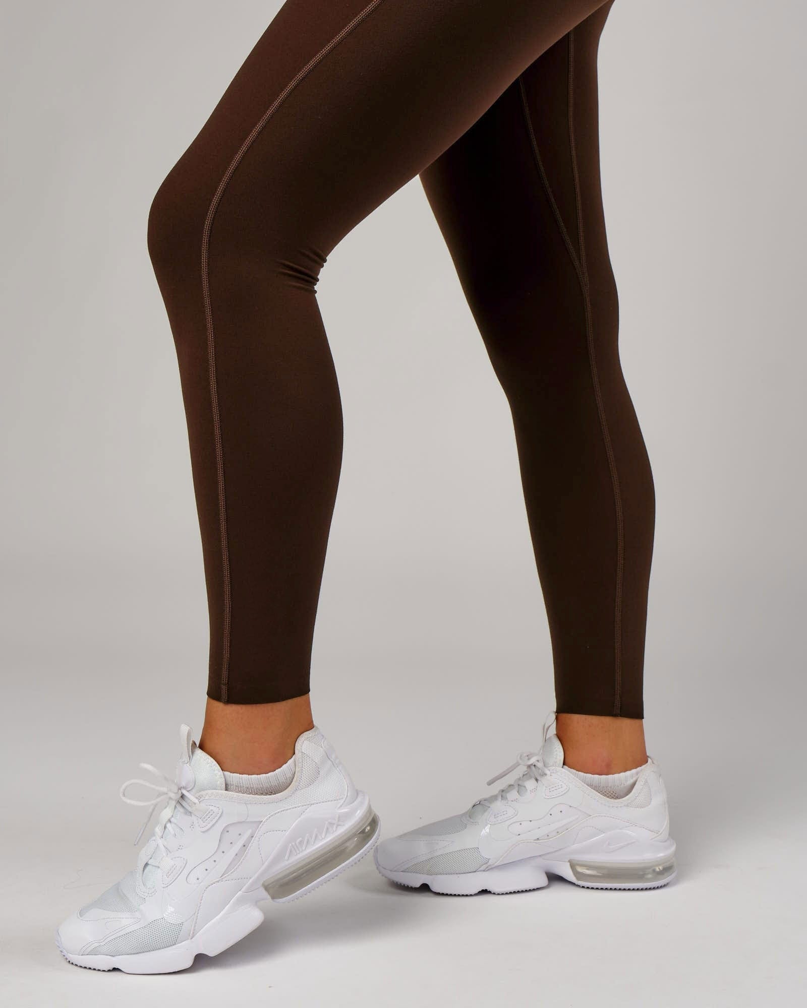 Model wearing Elixir 7/8 Length Tight - Chocolate No Logo