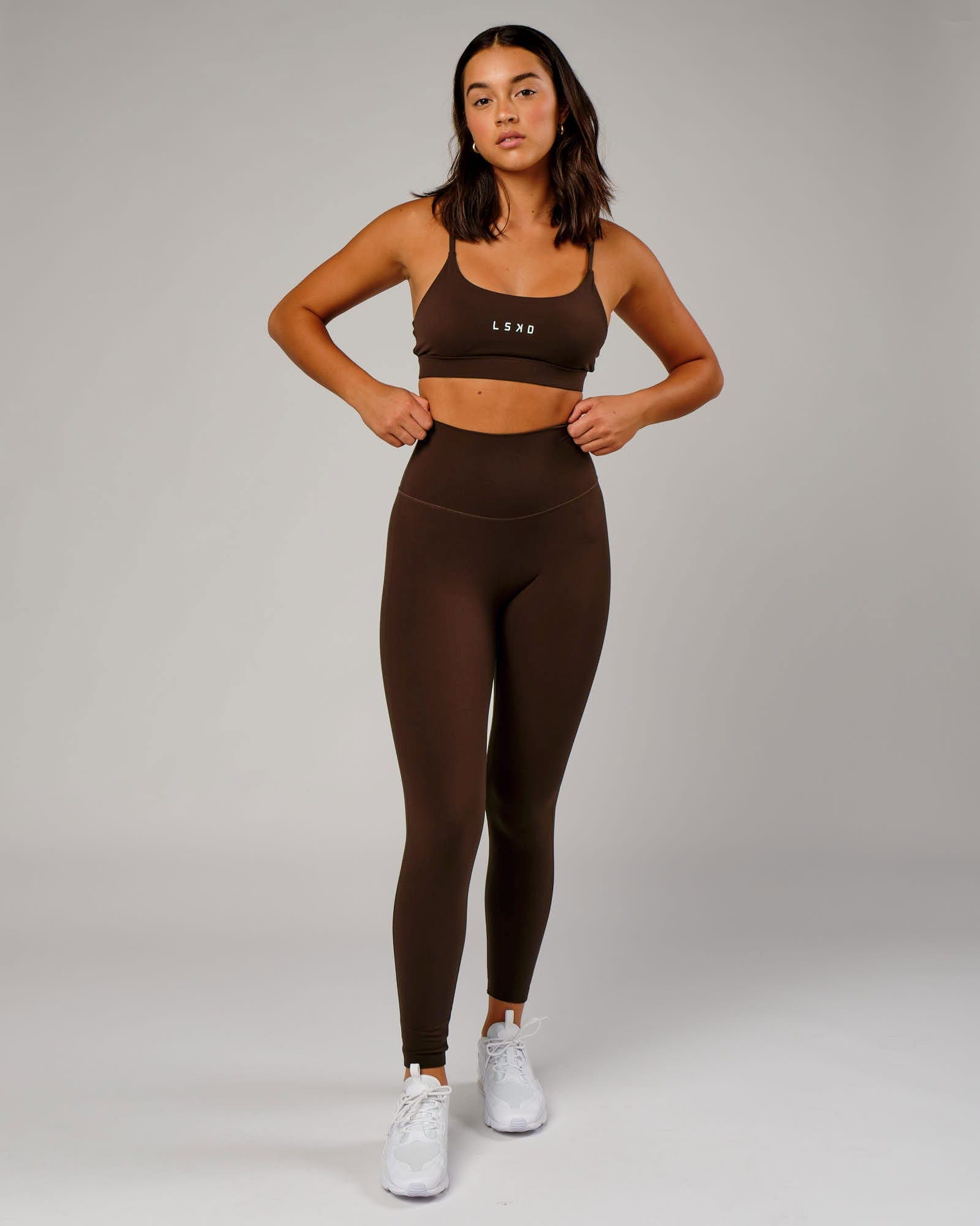 Model wearing Elixir Full Length Tight - Chocolate