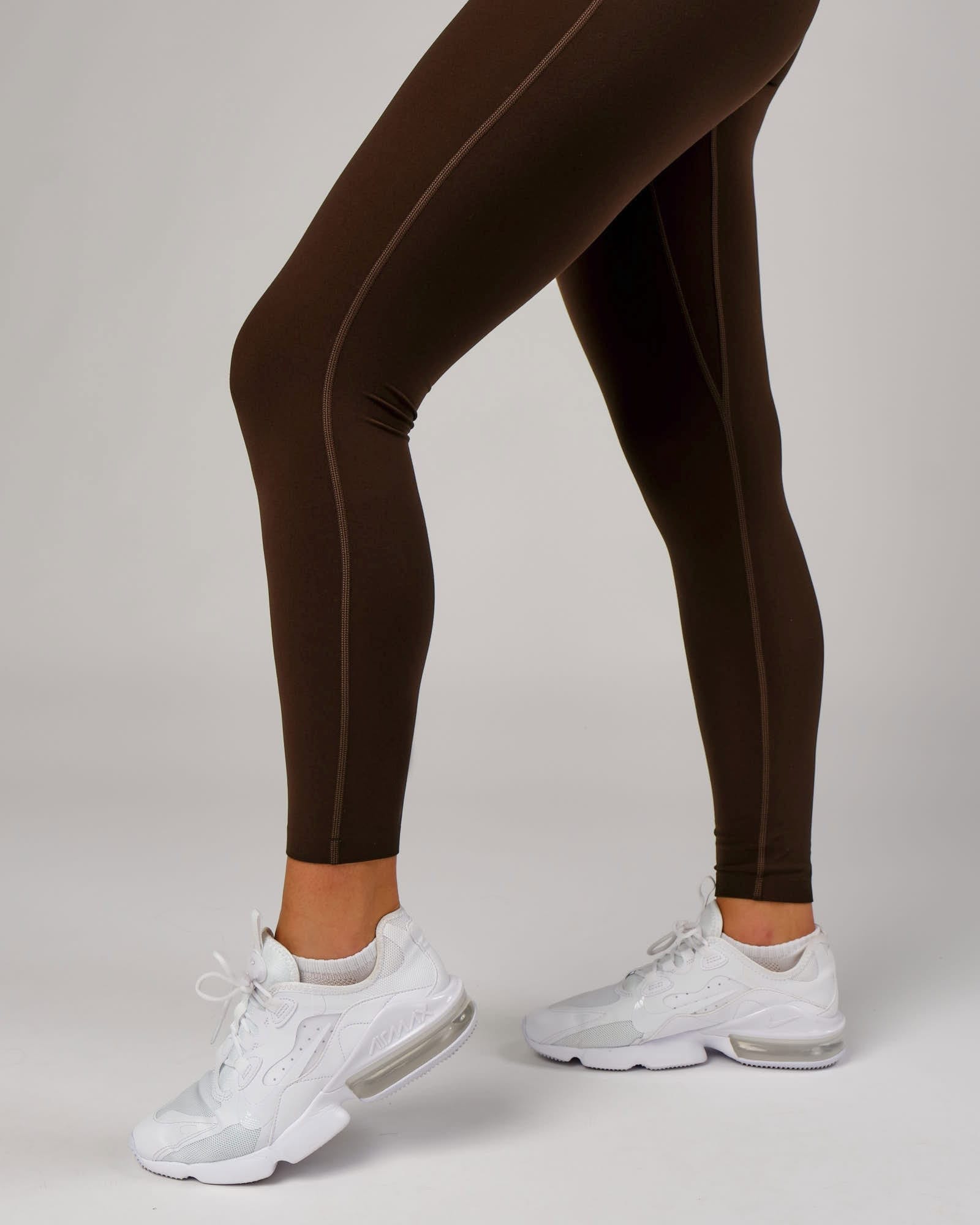 Model wearing Elixir Full Length Tight - Chocolate No Logo