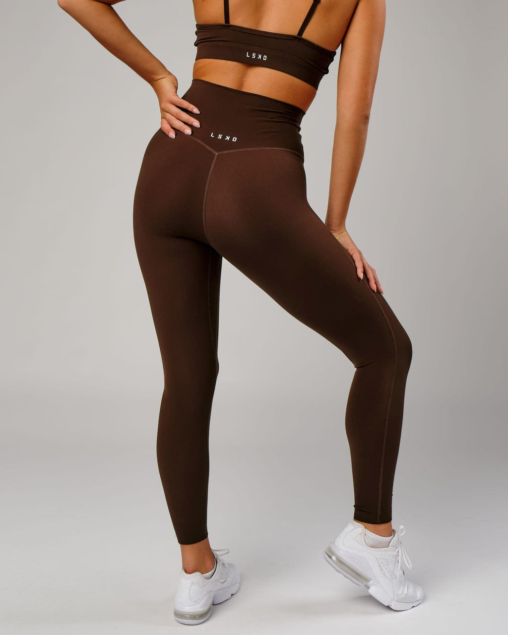 Model wearing Elixir Full Length Tight - Chocolate No Logo