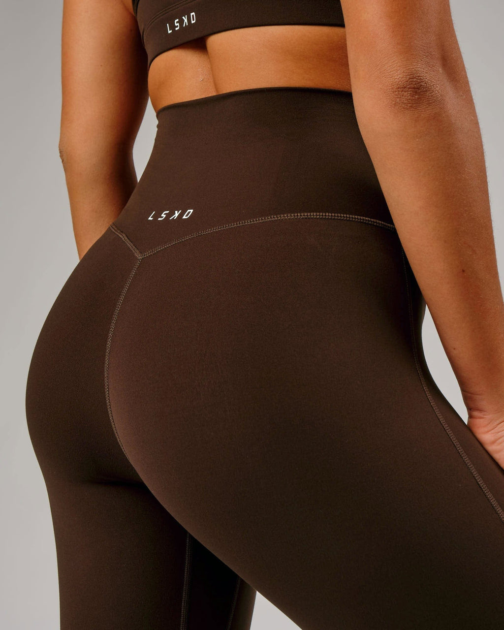 Model wearing Elixir Full Length Tight - Chocolate No Logo