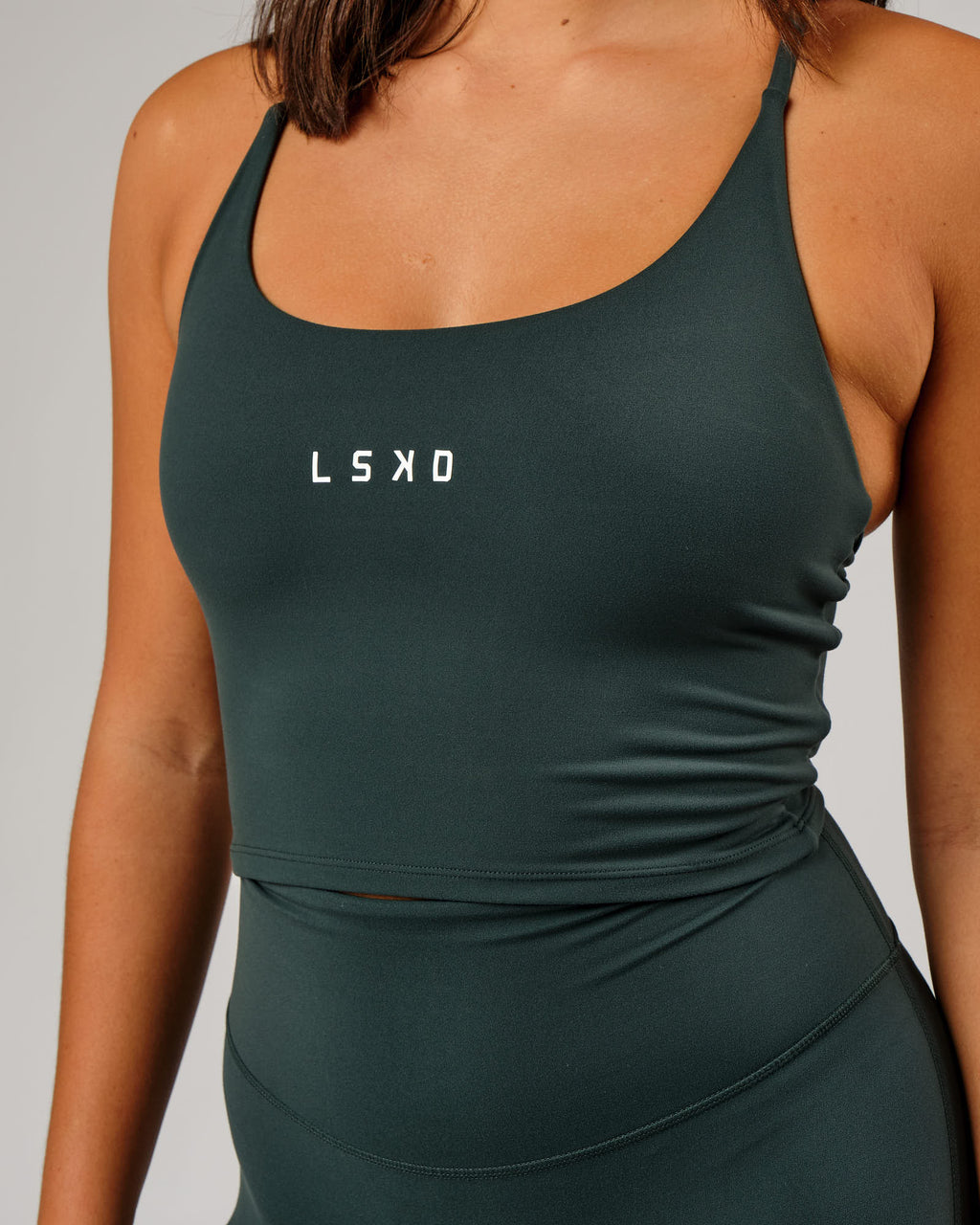 Model wearing Elixir Active Tank - Vital Green